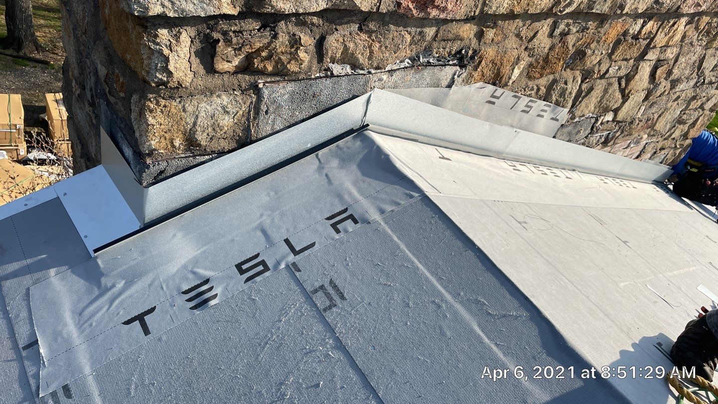 Tesla Solar Roof Replacement by American Home Contractors