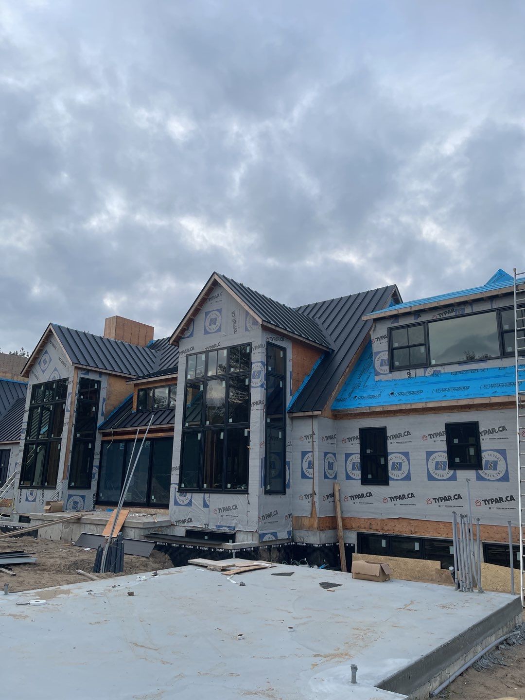 New Home Construction using 16" Standing Seam Panels by Jay Carter Roofing & Sheet Metal