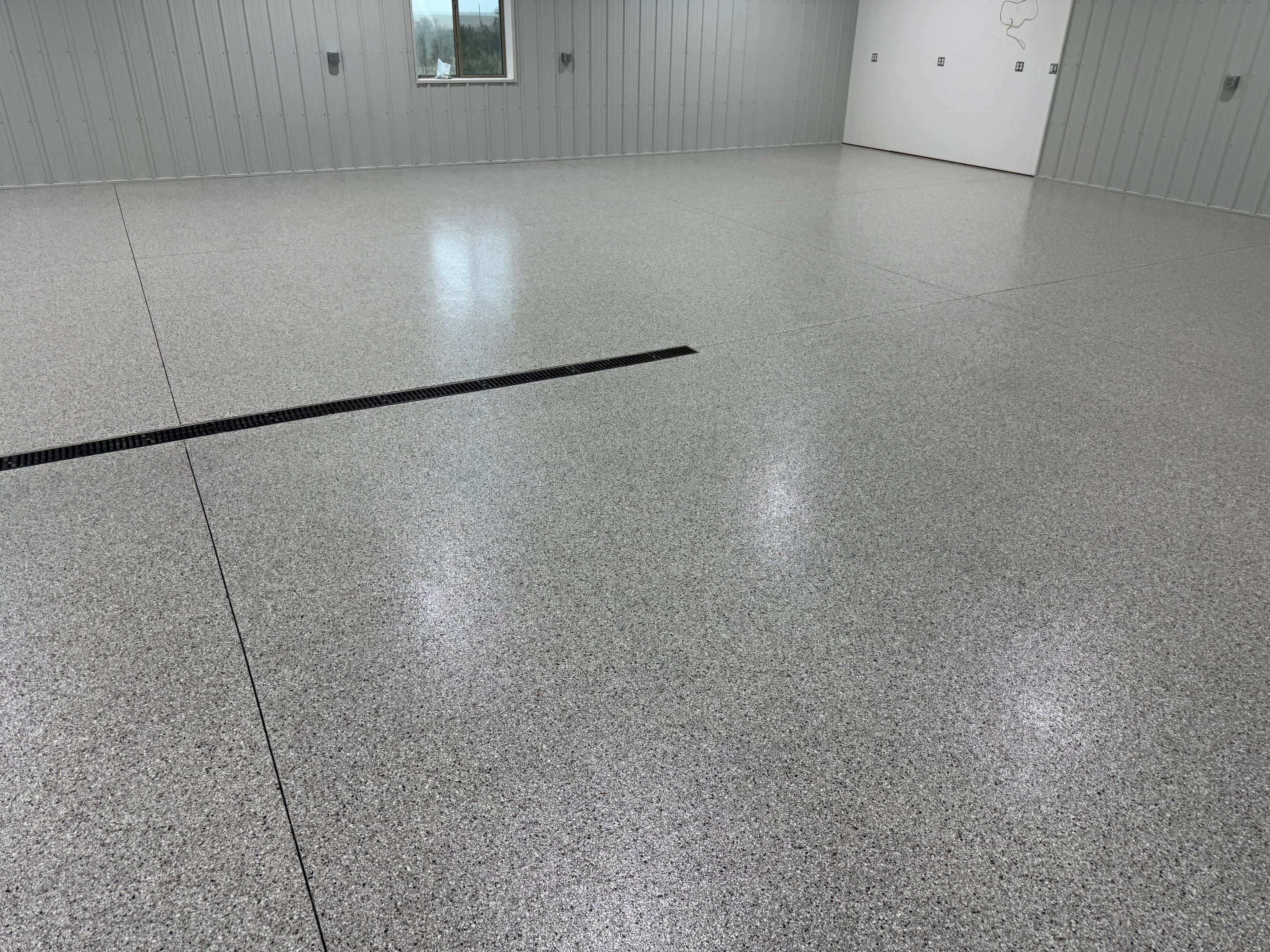 Custom Speckled Floor Coating for Large Montrose Shop by Select Painting, Coatings & Garage Cabinets