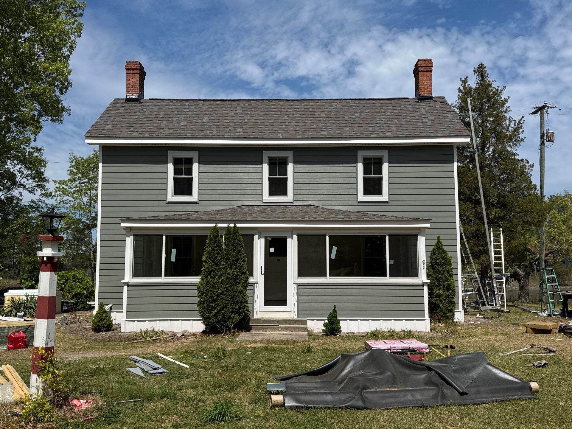 Waterfront Exterior Renovation in Port Haywood by Cade Construction