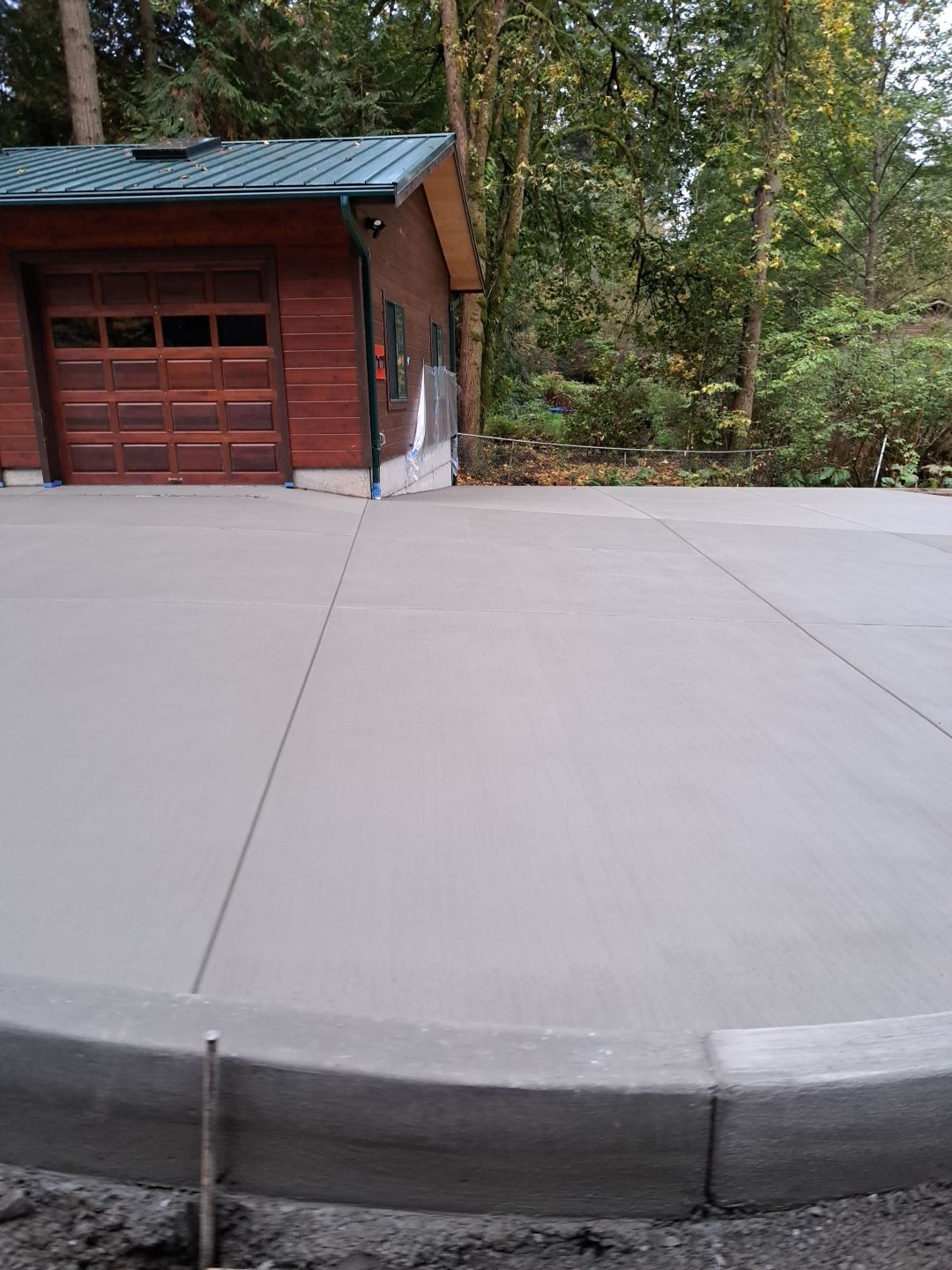 Pia | Custom Concrete Driveway, Walkway & Floating Steps by Jireh Asphalt & Concrete Inc 