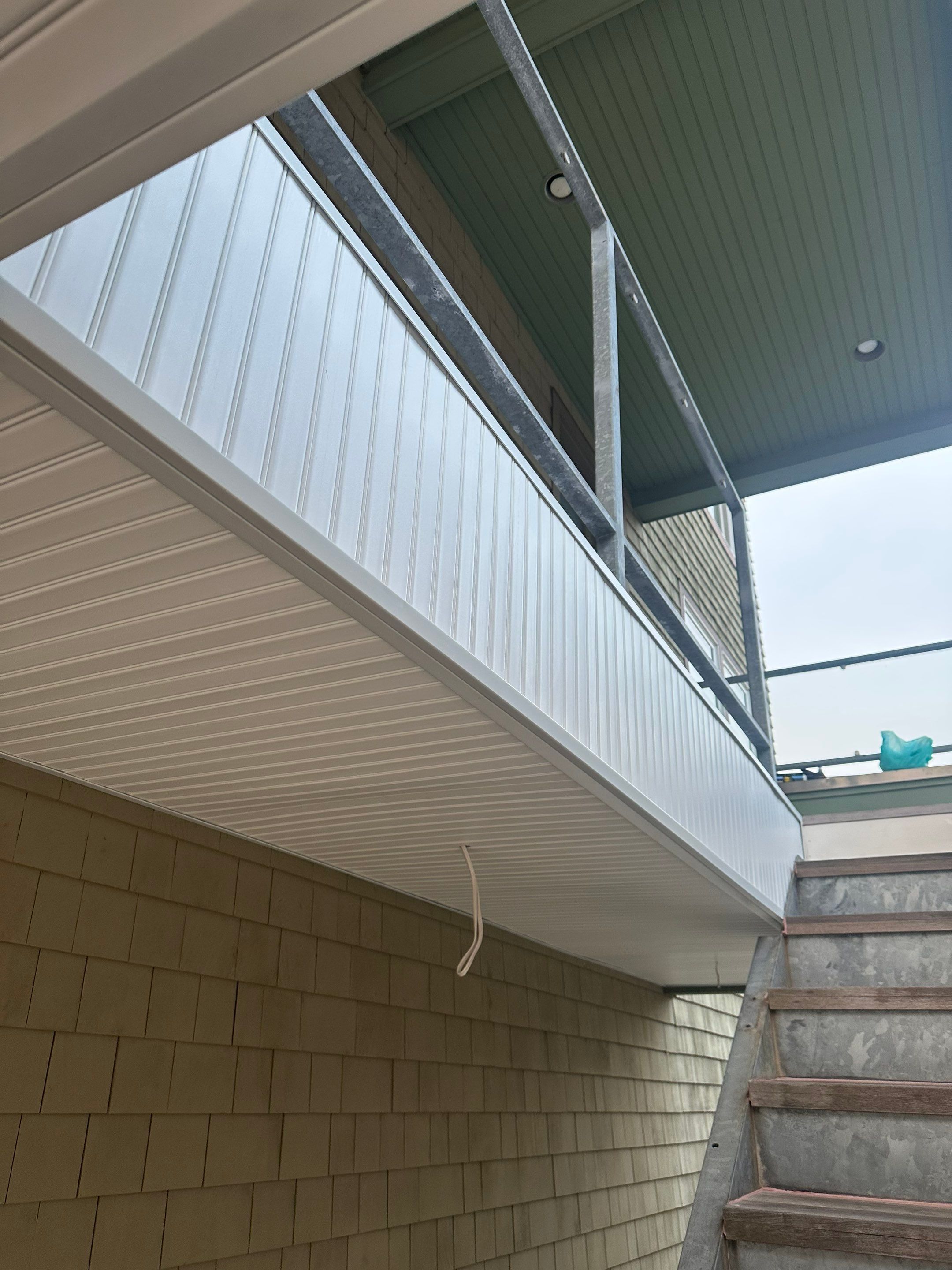 Deck Installation using Tanzite Stone Decking by A Plus Exterior