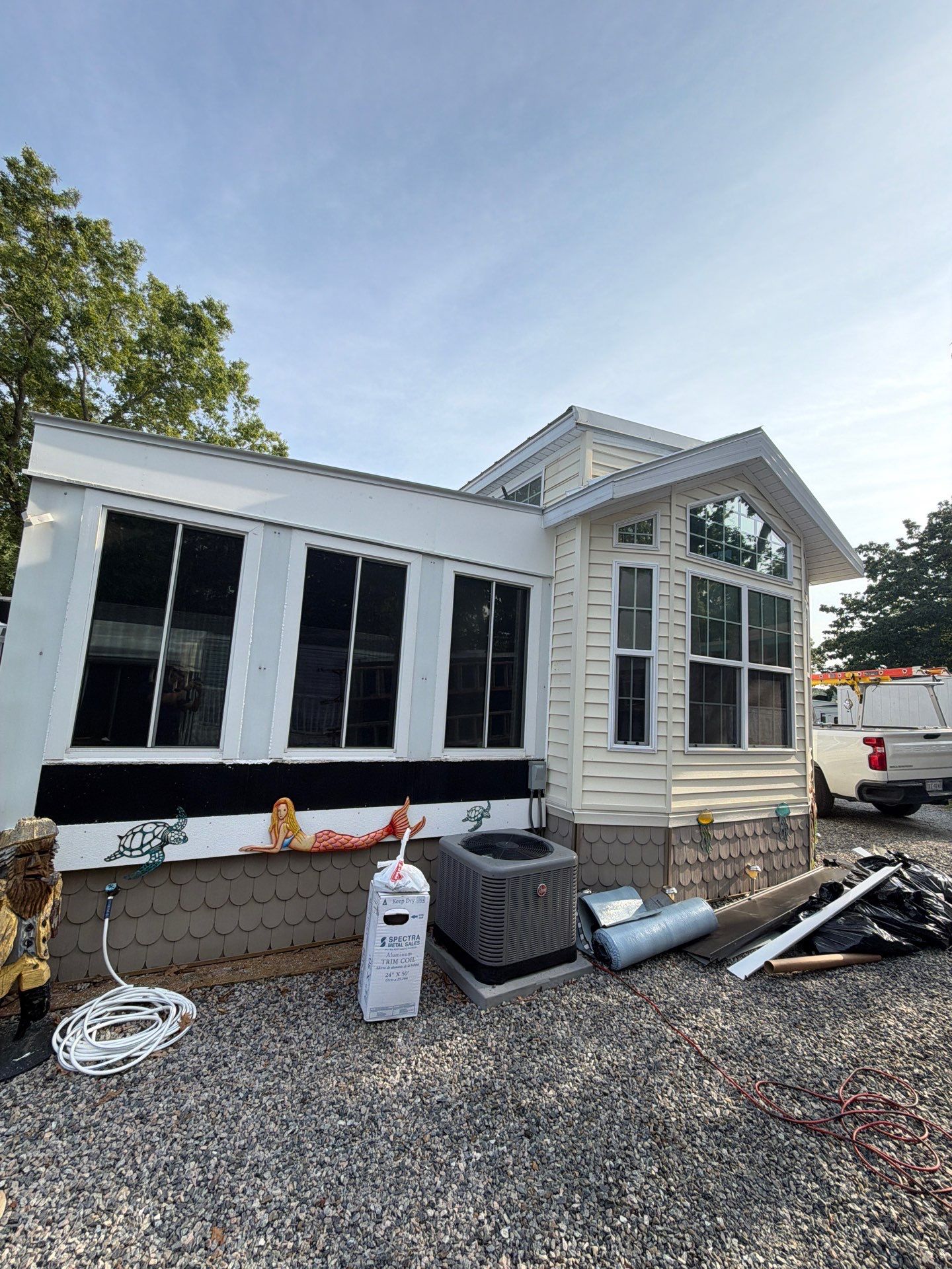 White Standing Seam Metal Roof Installation in Wake, VA by Cade Construction