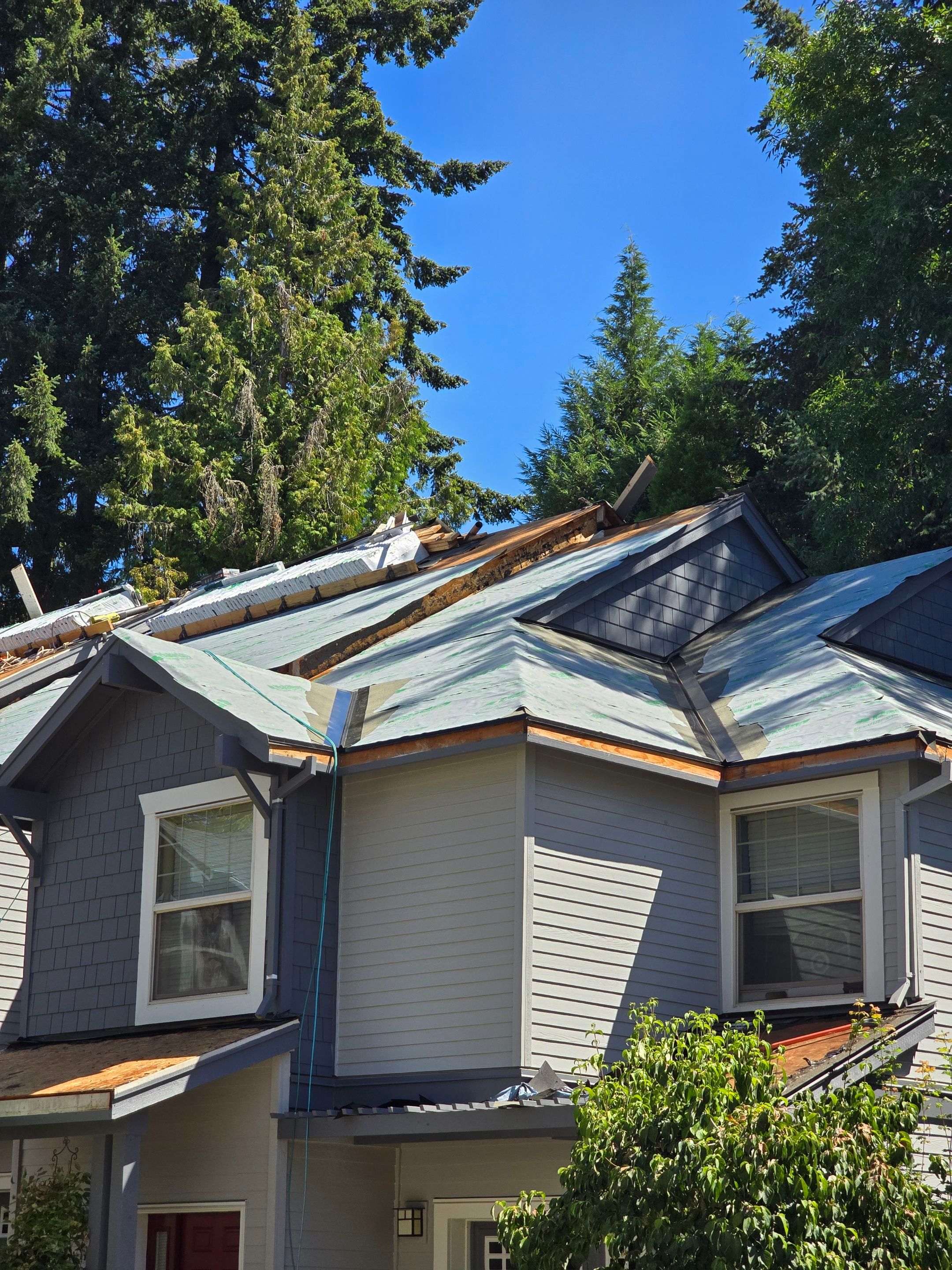 Dawson Station Reroof and Gutters by Hawthorne General Construction