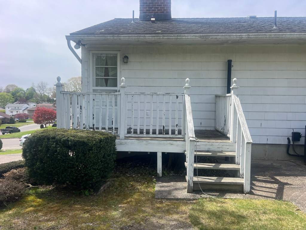 Deck Replacement using Trex Tropical Havana Gold and Transcend White Railings and white lattice by DiGiorgi Roofing and Siding Inc