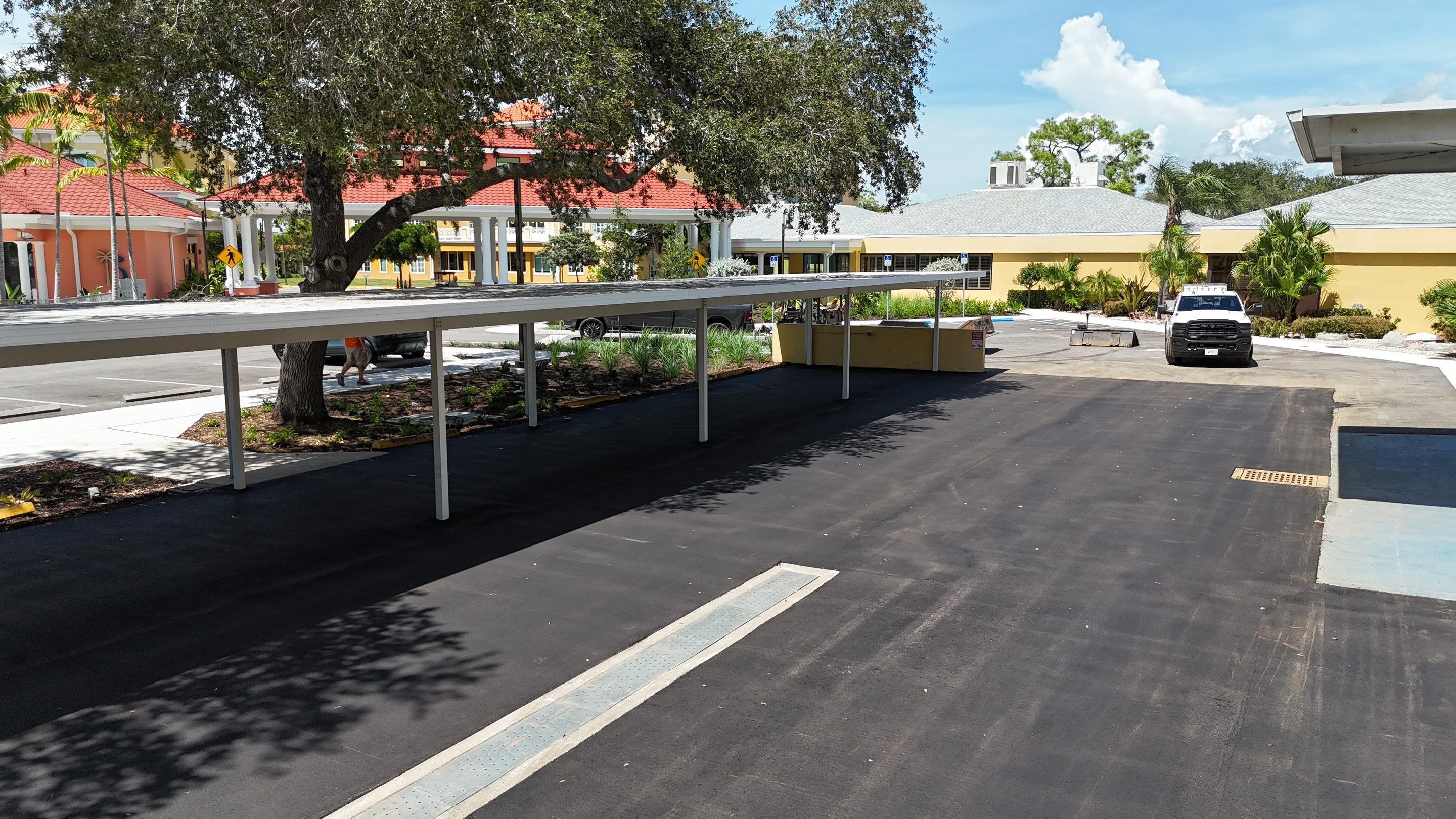 Comprehensive Parking Lot Mill and Overlay with Custom Line Striping in Venice by Everline Coatings & Services - Southwest FL