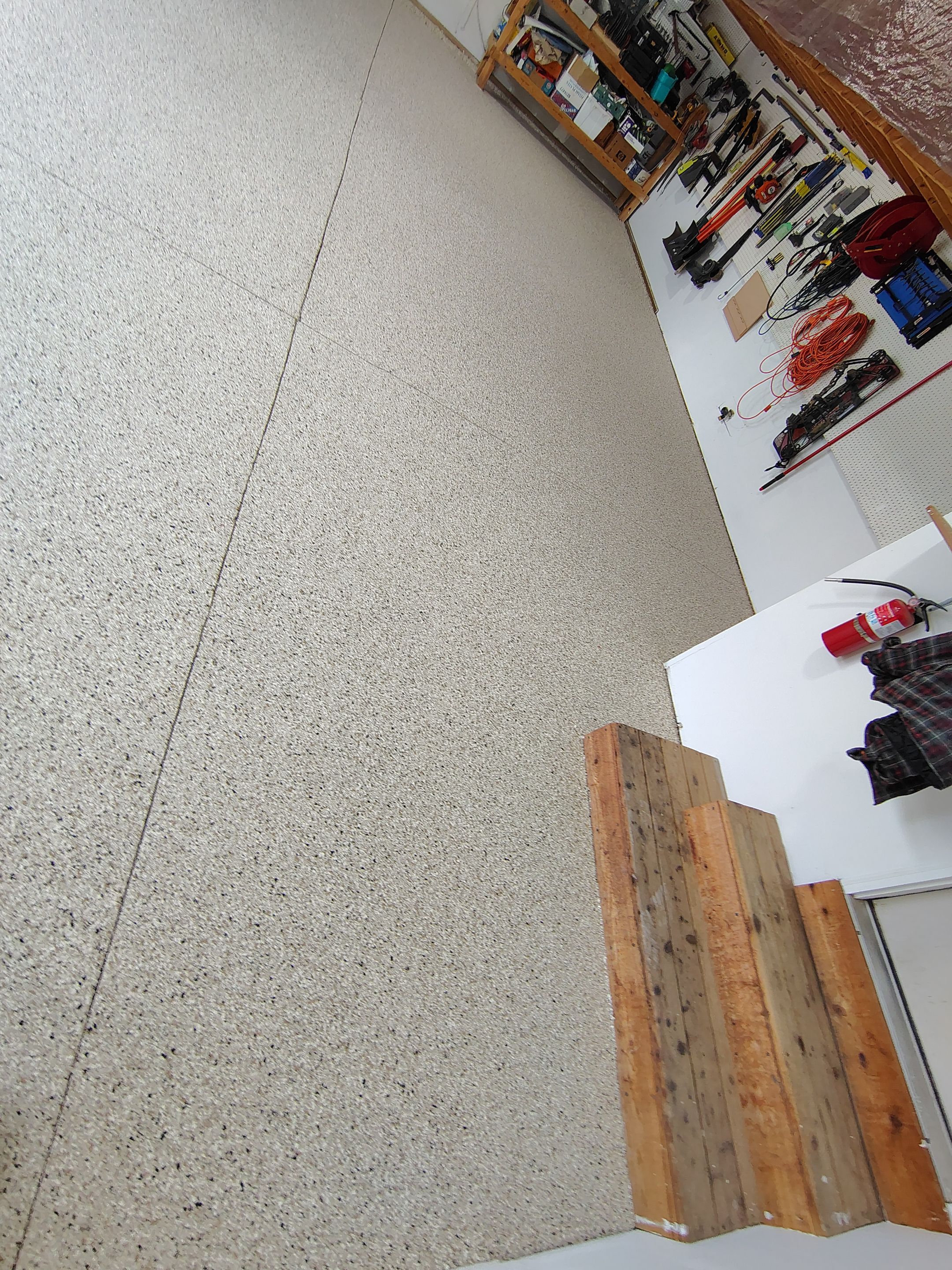 Durable Garage Floor Coating in Brandon by Select Painting, Coatings & Garage Cabinets