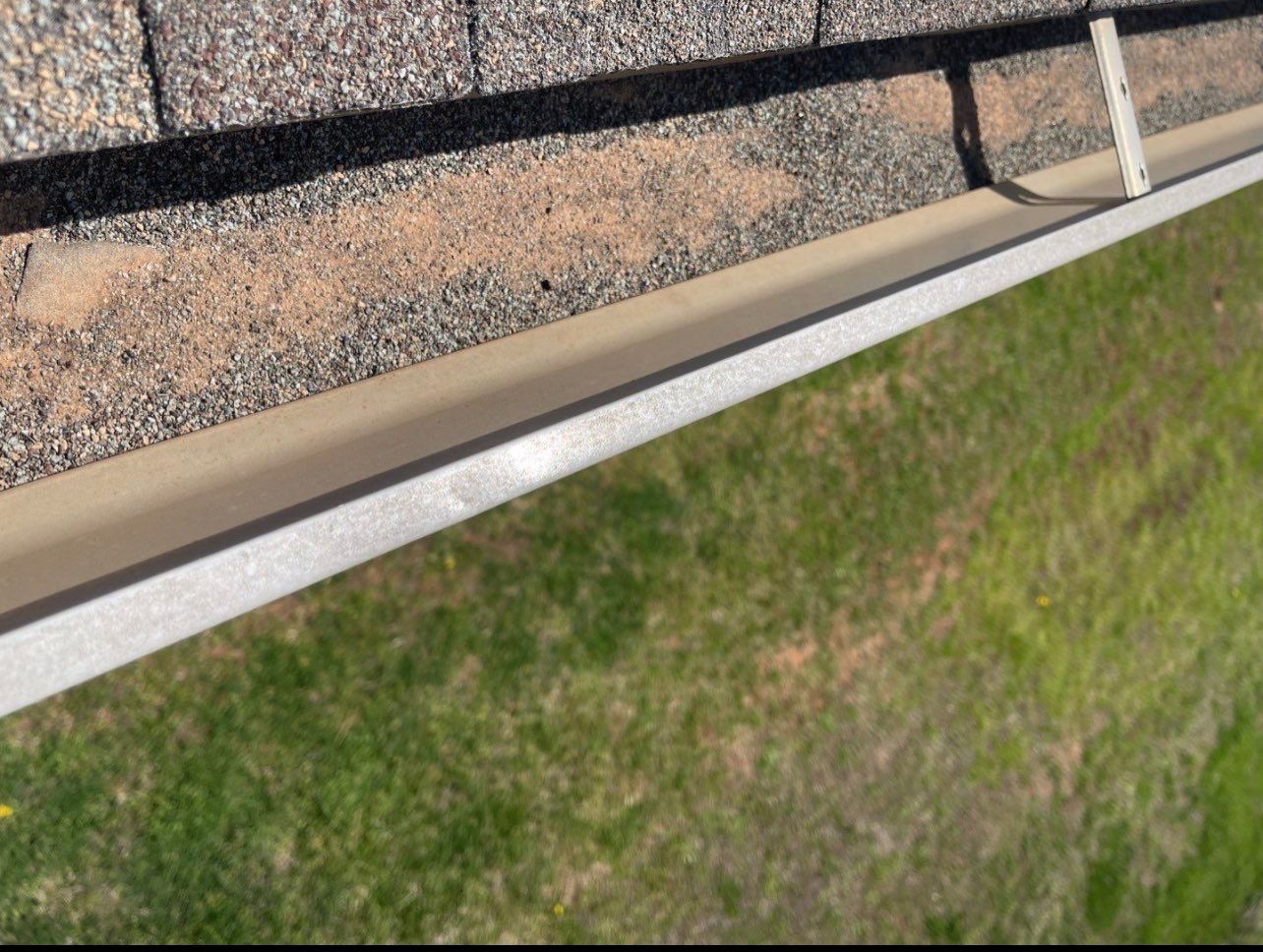 Hail Damage on a Roofing System by Icon Roofing And Construction 