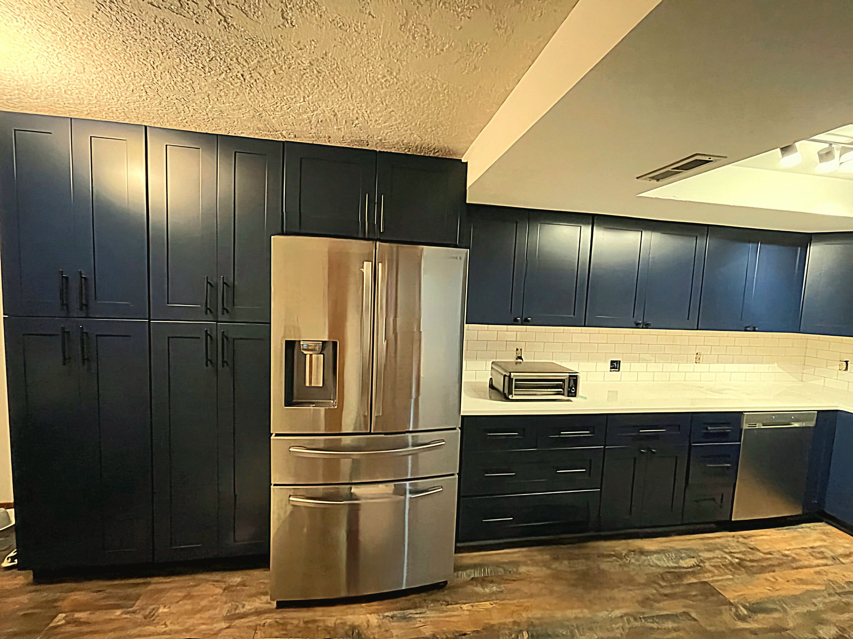 outdated Kitchen to a modern and simplistic kitchen area by Crm Services Llc