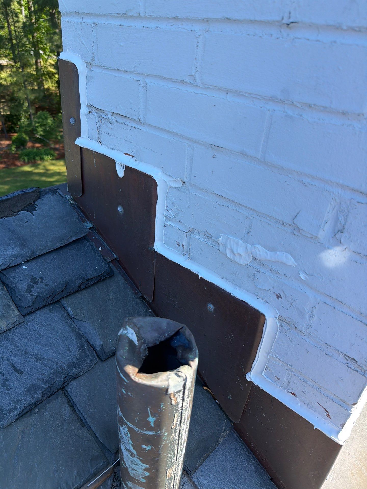 Historical Slate Roof Repair and Chimney Flashing Restoration in West Point by Cade Construction