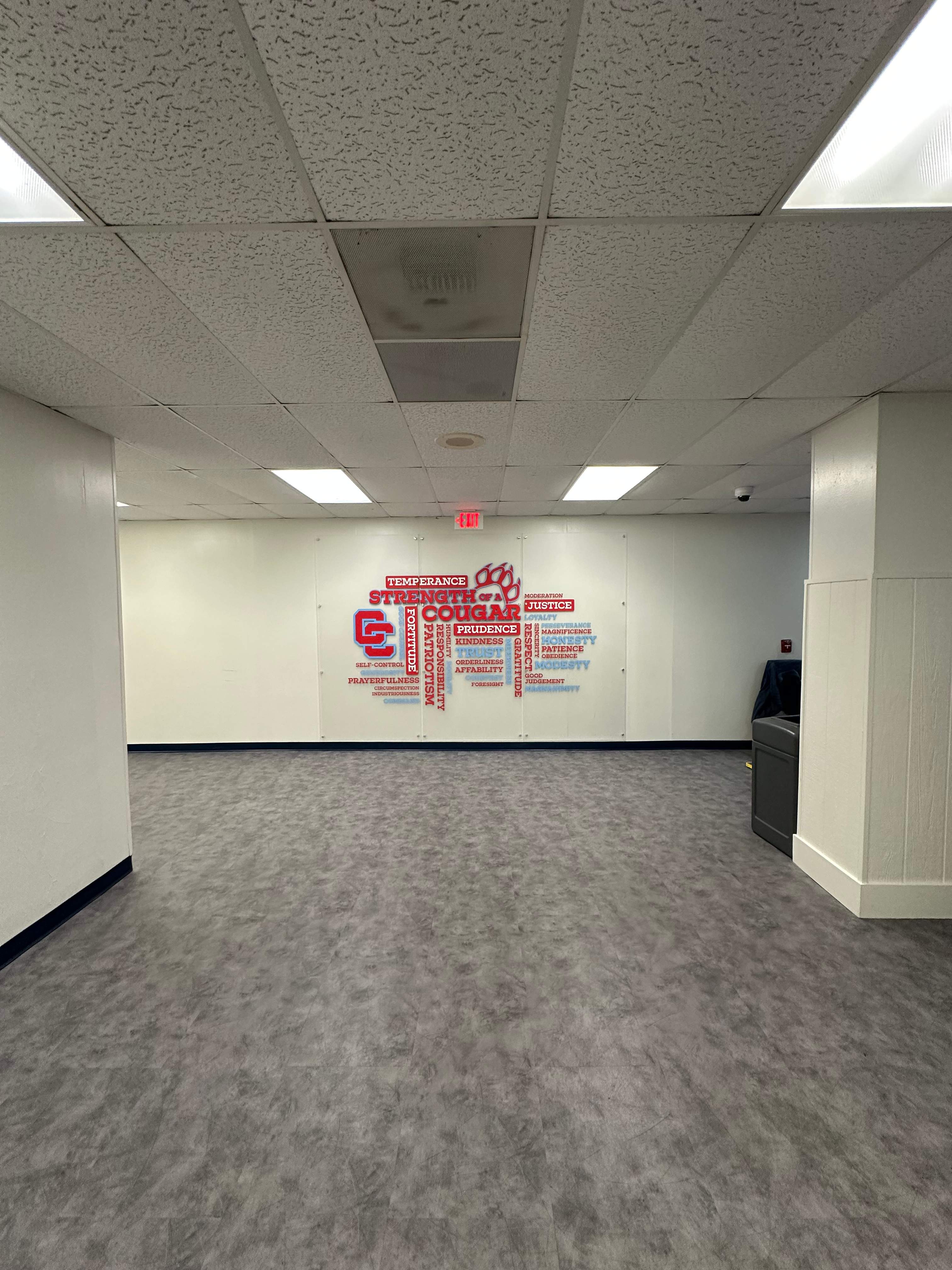 Charlotte Catholic High School - Interior Acrylic & Vinyl Wall Signage by QC Signs and Graphics