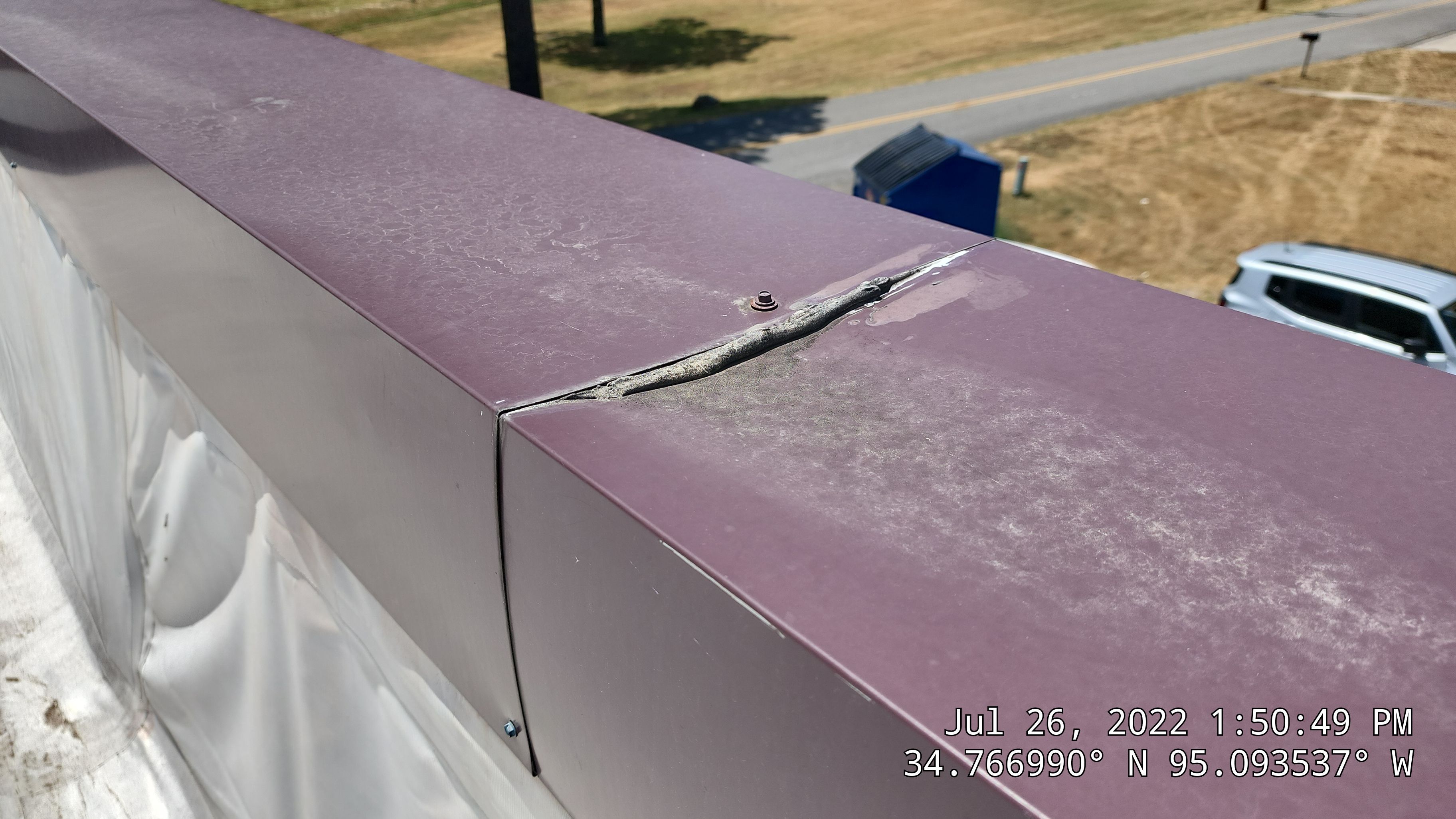 Choctaw Nation Healthcare Center - White Building by Hostetler Roofing