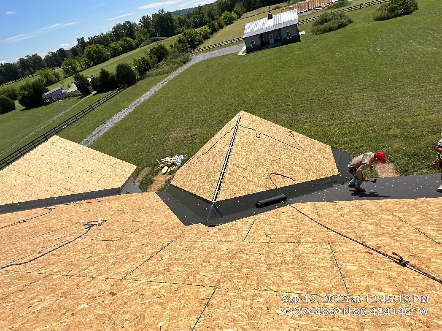 Residential Roofing Installation using Tamko Heritage AR with Standing Seam Metal Porch by Undersun Roofing 
