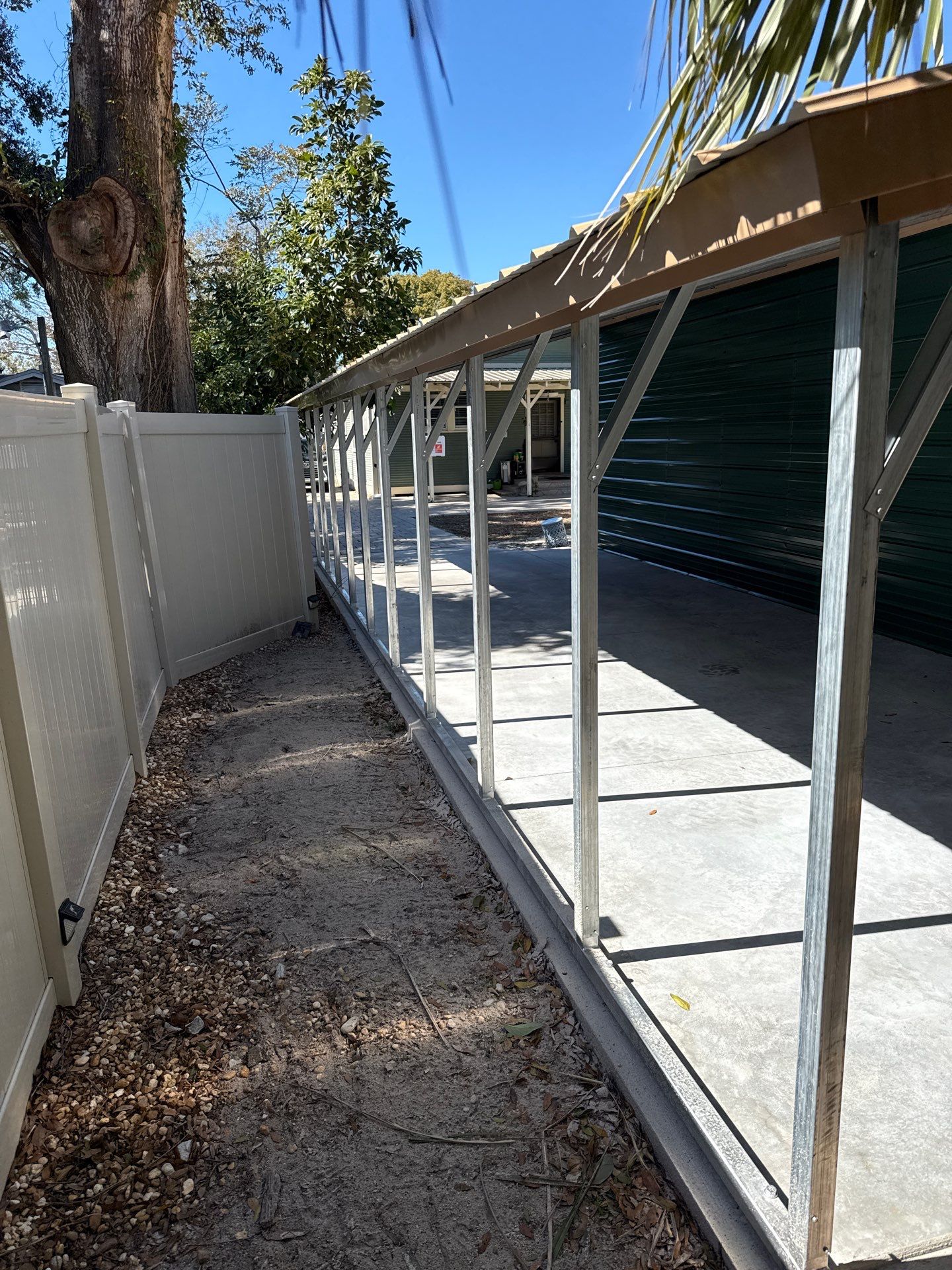 White 6-inch K-style Gutters and Down Spouts using Seamless Gutters White Down Spouts in Tampa FL by Gutter Professors