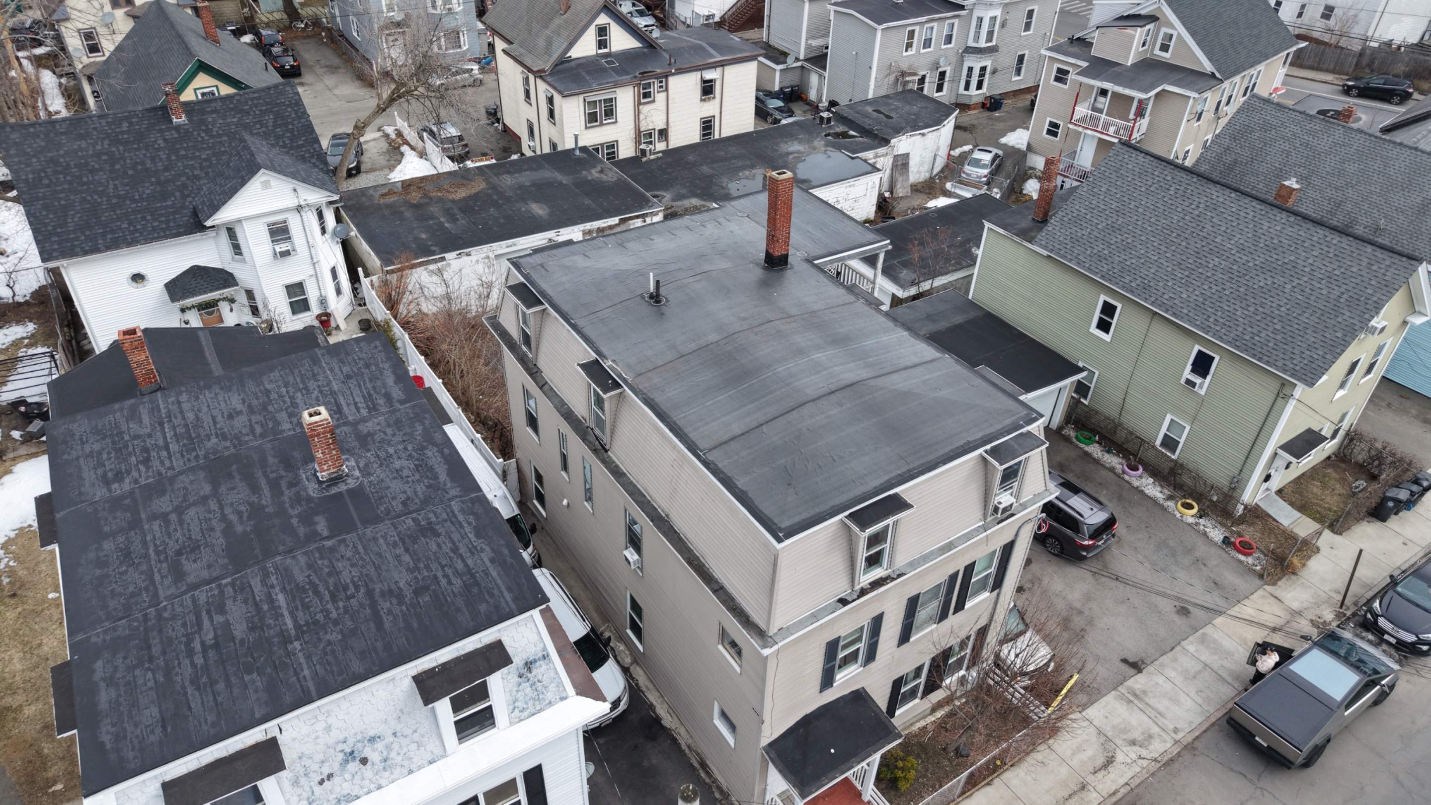Gravel Roof Tear-Off & EPDM Rubber Roof Conversion in Haverhill, MA by JOHNNYS PRO