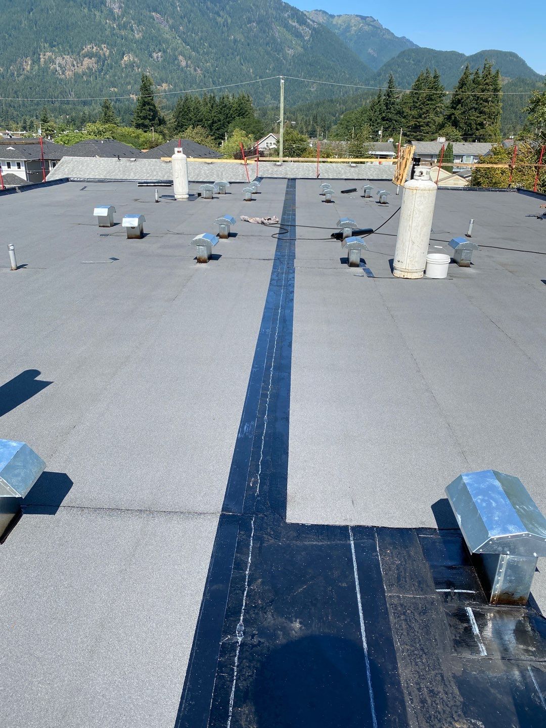Residential ReRoofing Installation using IKO 2ply sbs  by Top Notch Roofing Inc
