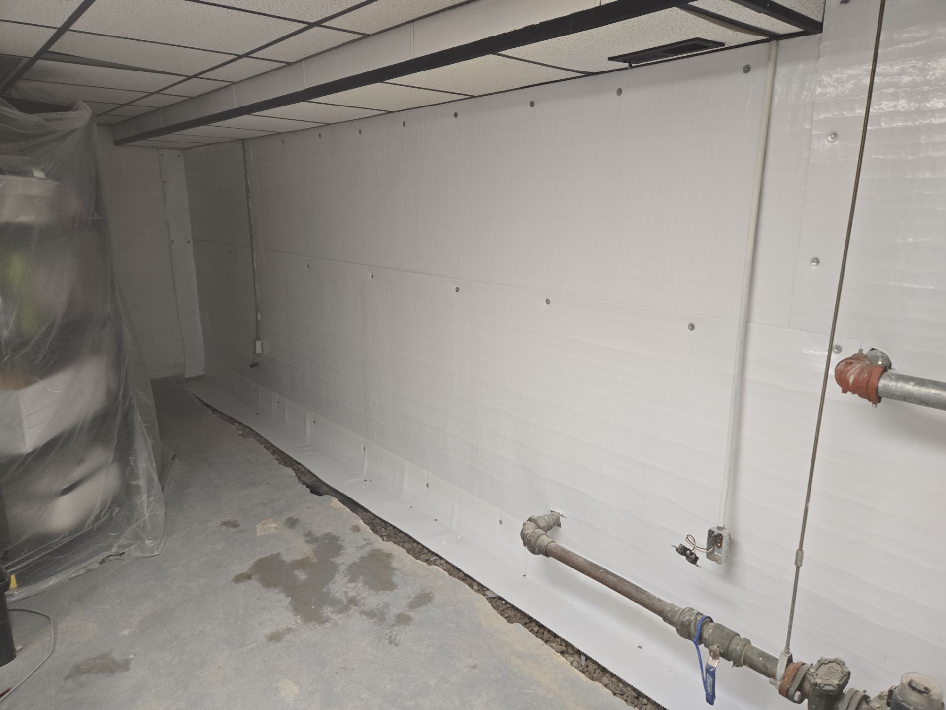 Interior Basement Waterproofing System with Embedded Fiber Reinforcement by Toledo Basement Repair 