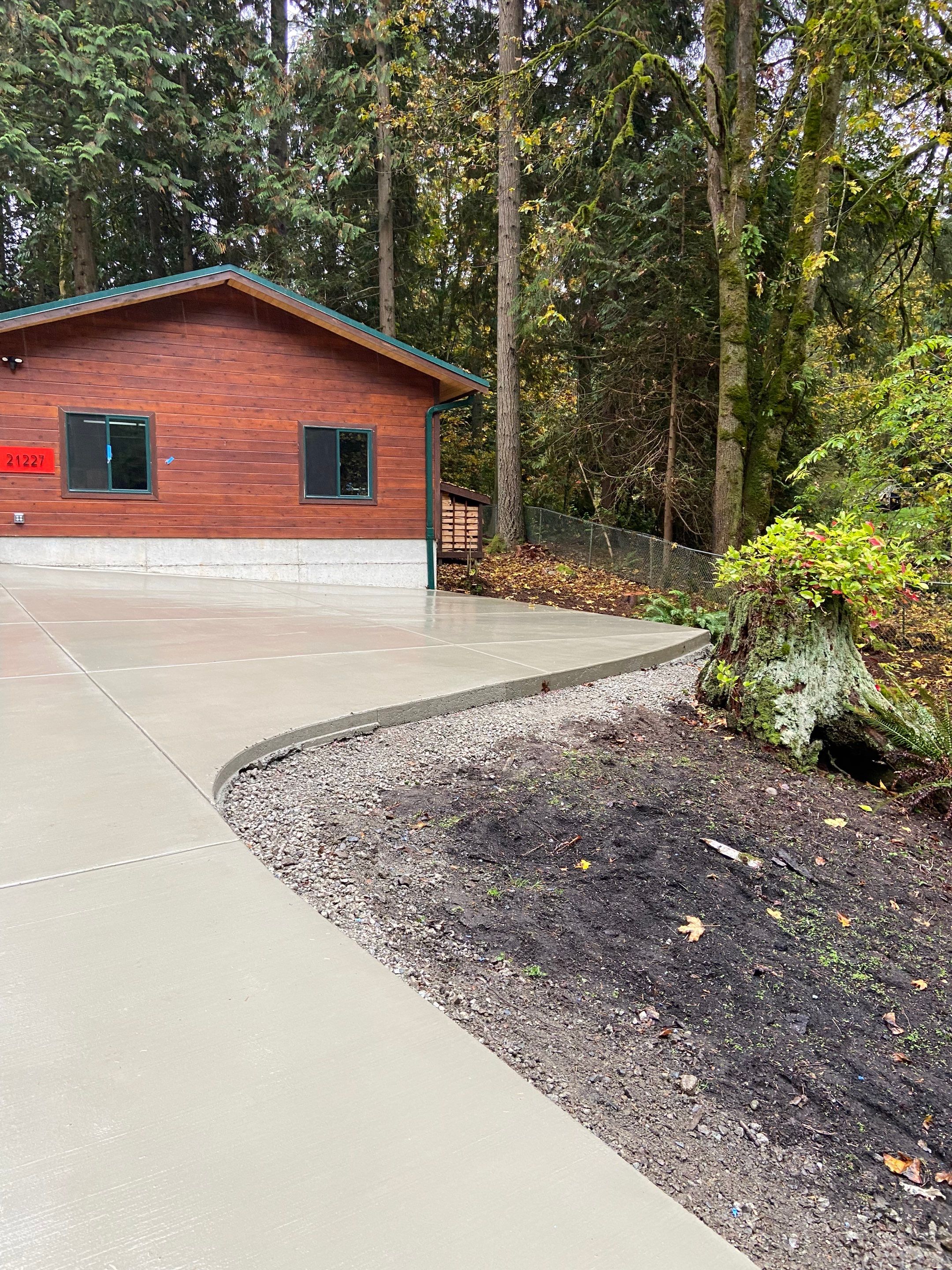 Pia | Custom Concrete Driveway, Walkway & Floating Steps by Jireh Asphalt & Concrete Inc 