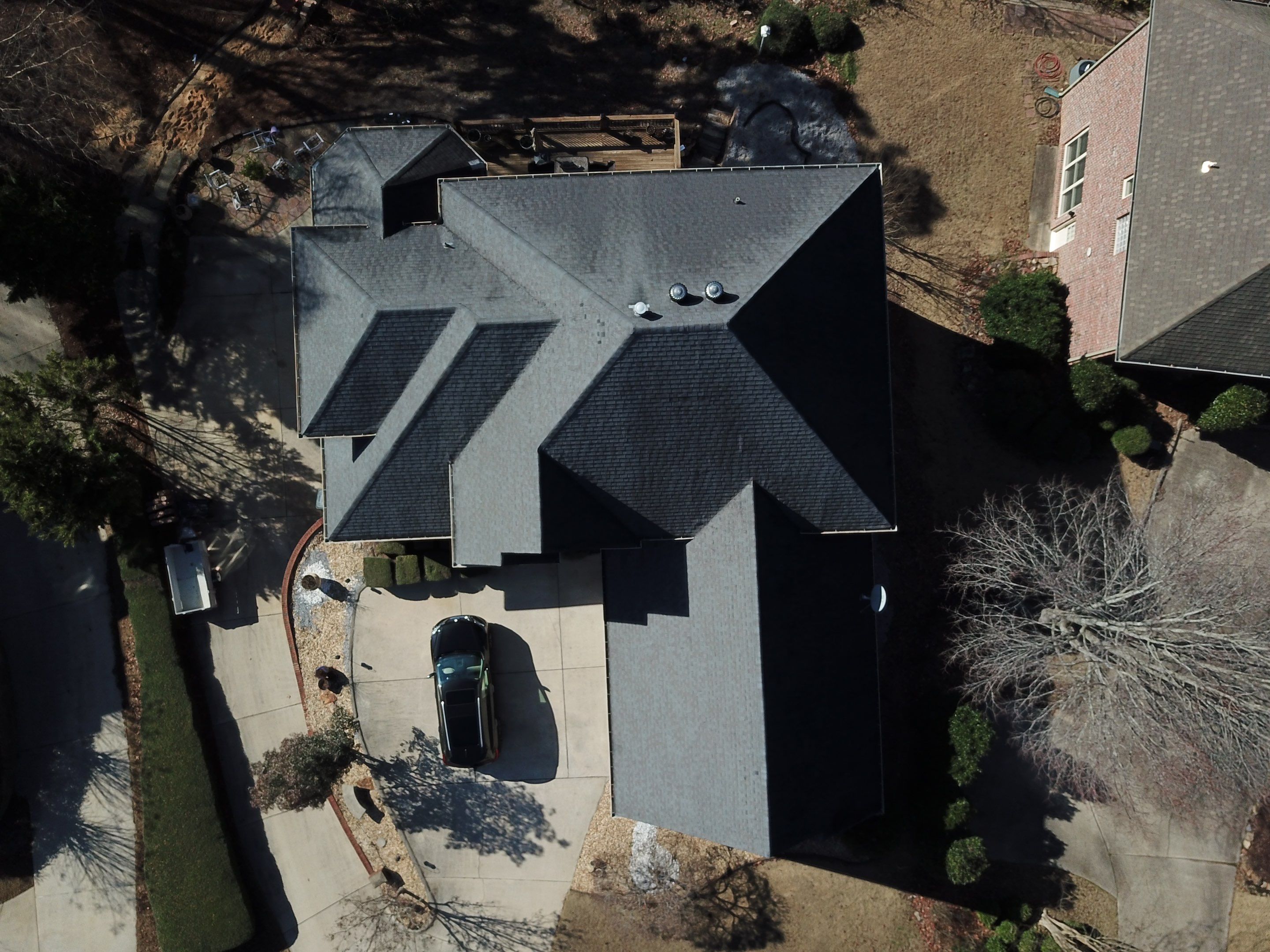Shingle/Gutter Replacement in Hoover (Weatherwood) by The Roofing Dudes