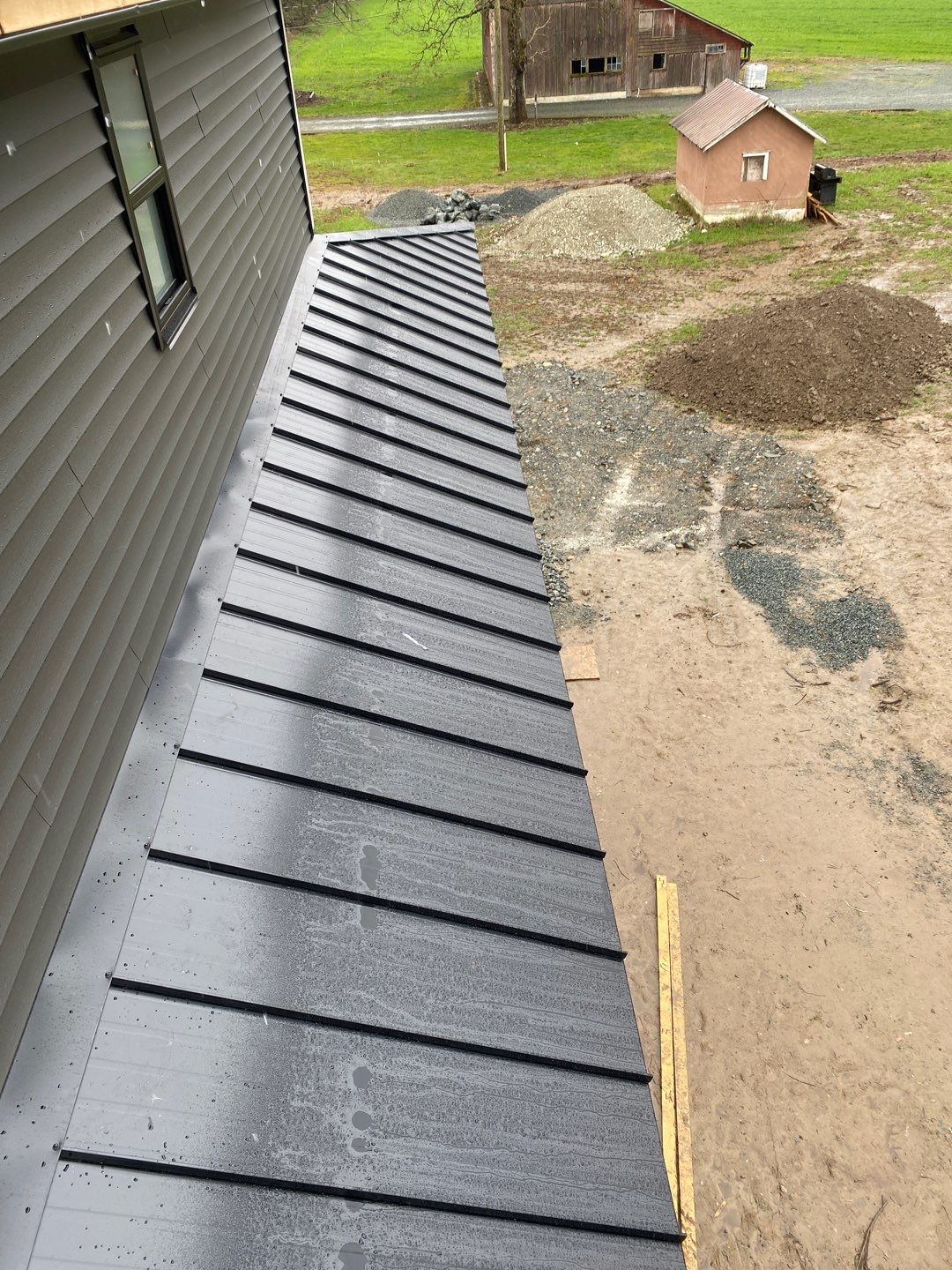 Residential Roofing Installation using 16" Prolok metal and Owens corning shingles by Top Notch Roofing Inc