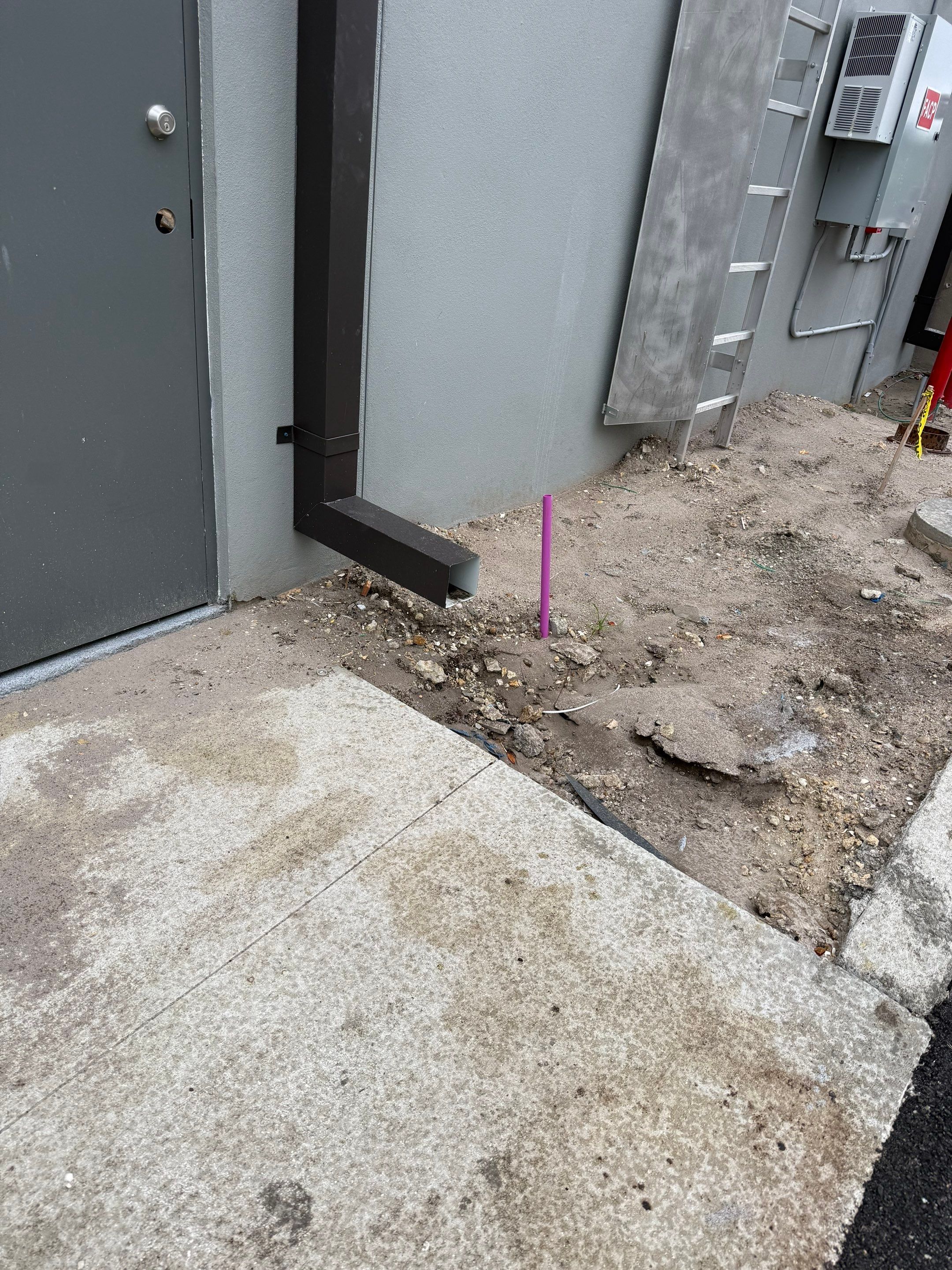 Downspout Installation using collector head in Cape Coral FL by Gutter Professors