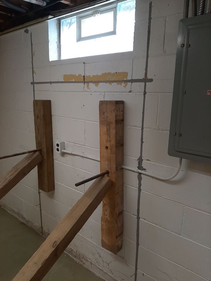 Wall Straightening and Reinforcement using Embedded Fiber Reinforcement by Toledo Basement Repair 