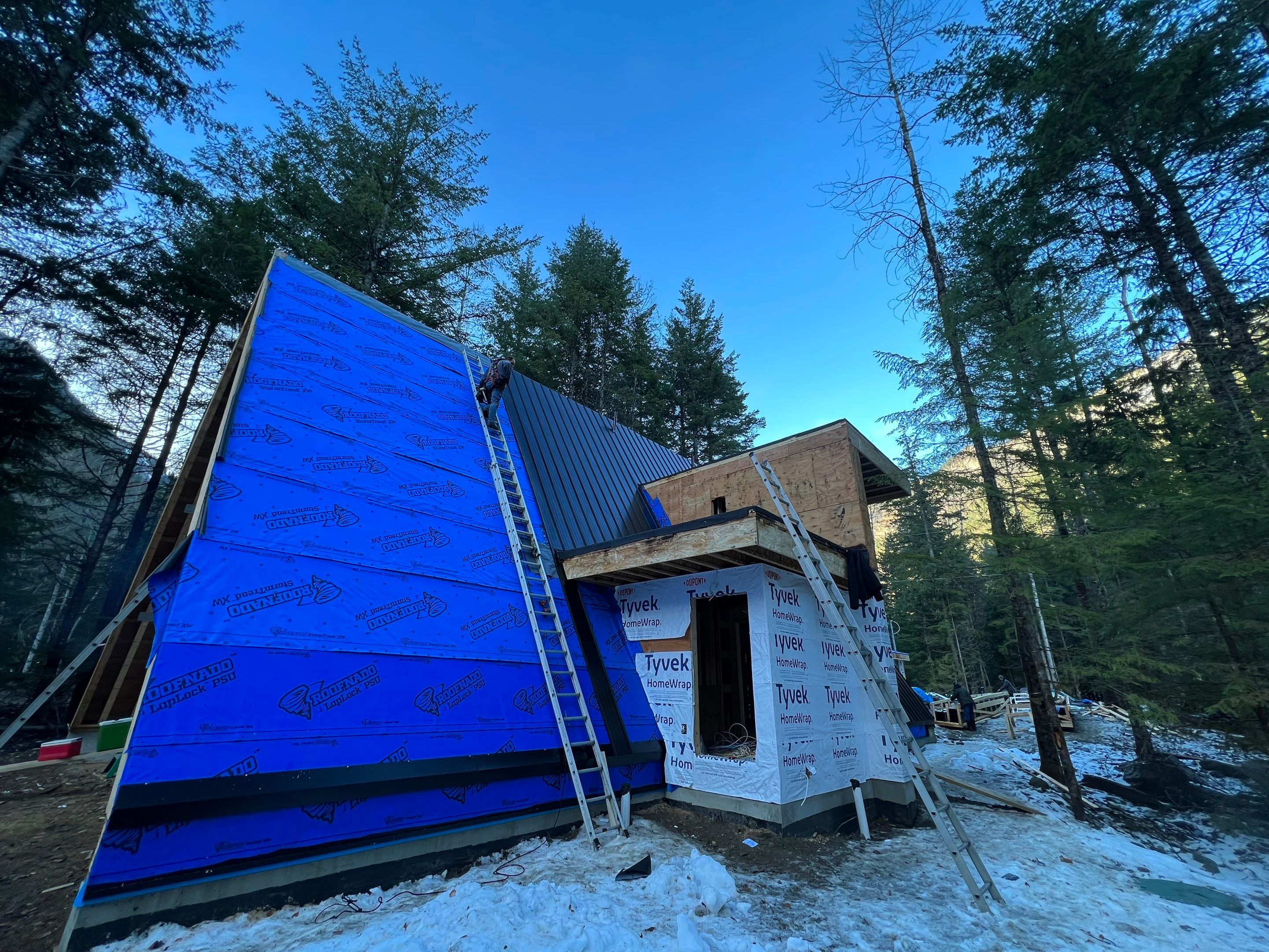 Residential Roofing Installation using 12" Prolok metal  by Top Notch Roofing Inc