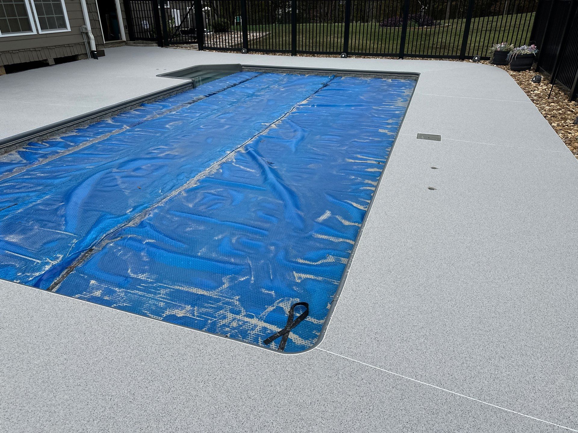 Pool Deck & Sidewalk using Quicksand & Obsidian by Elite Floor Solutions