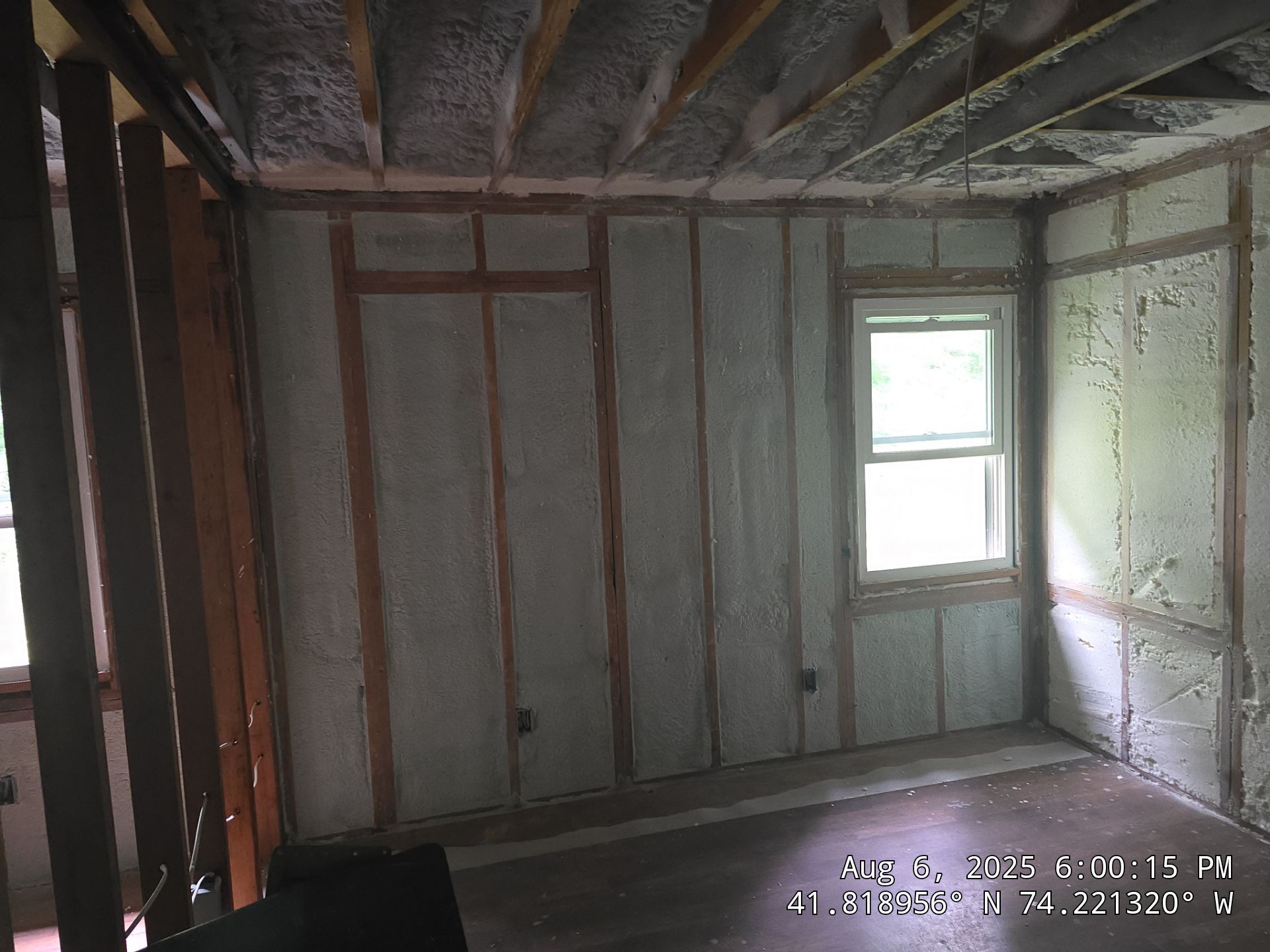 Master bedroom Exterior Walls using open cell spray foam by NYS Foam & Energy