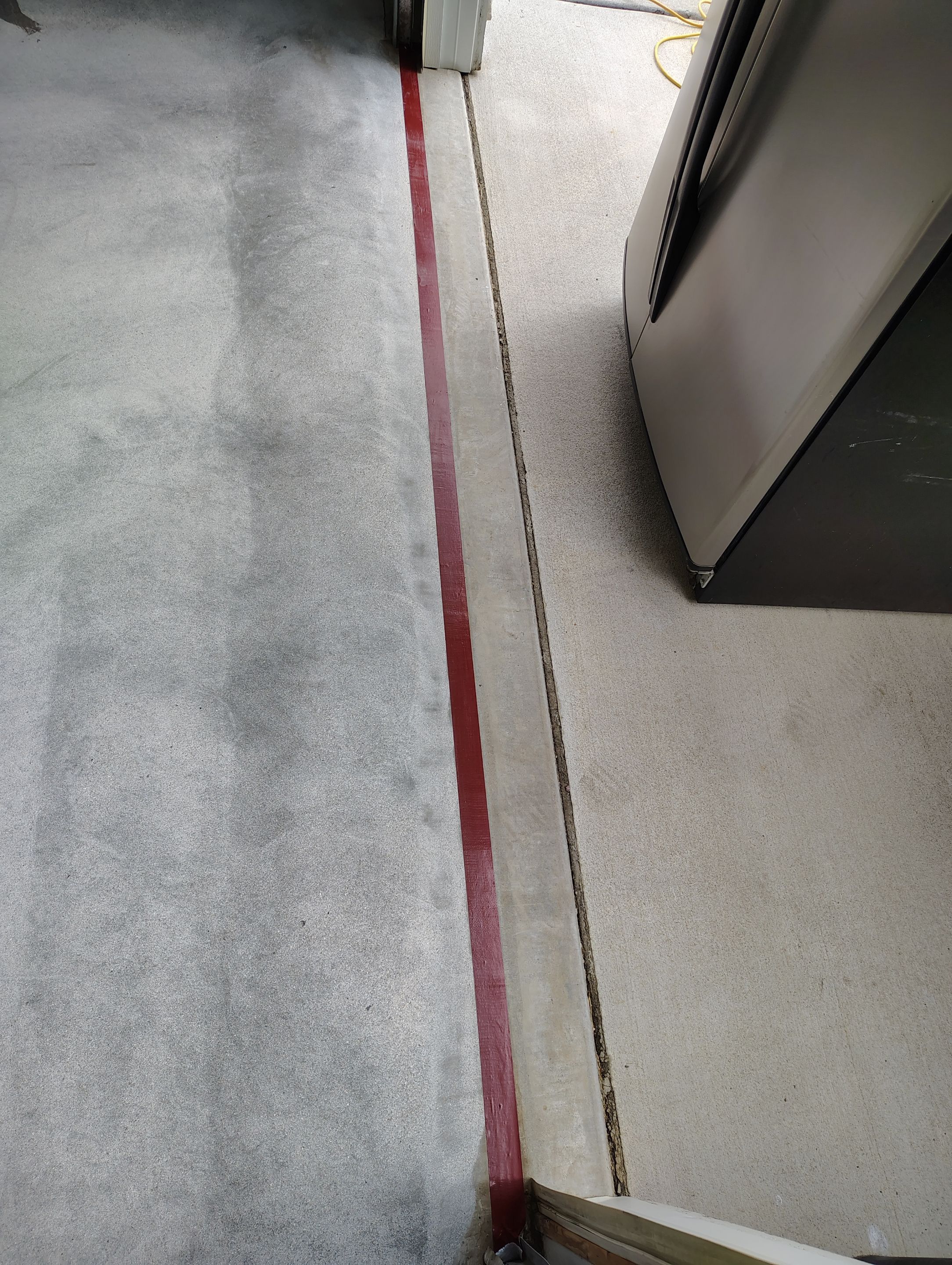 Multi-Car Garage Concrete Coating and Crack Repair in Dell Rapids by Select Painting, Coatings & Garage Cabinets