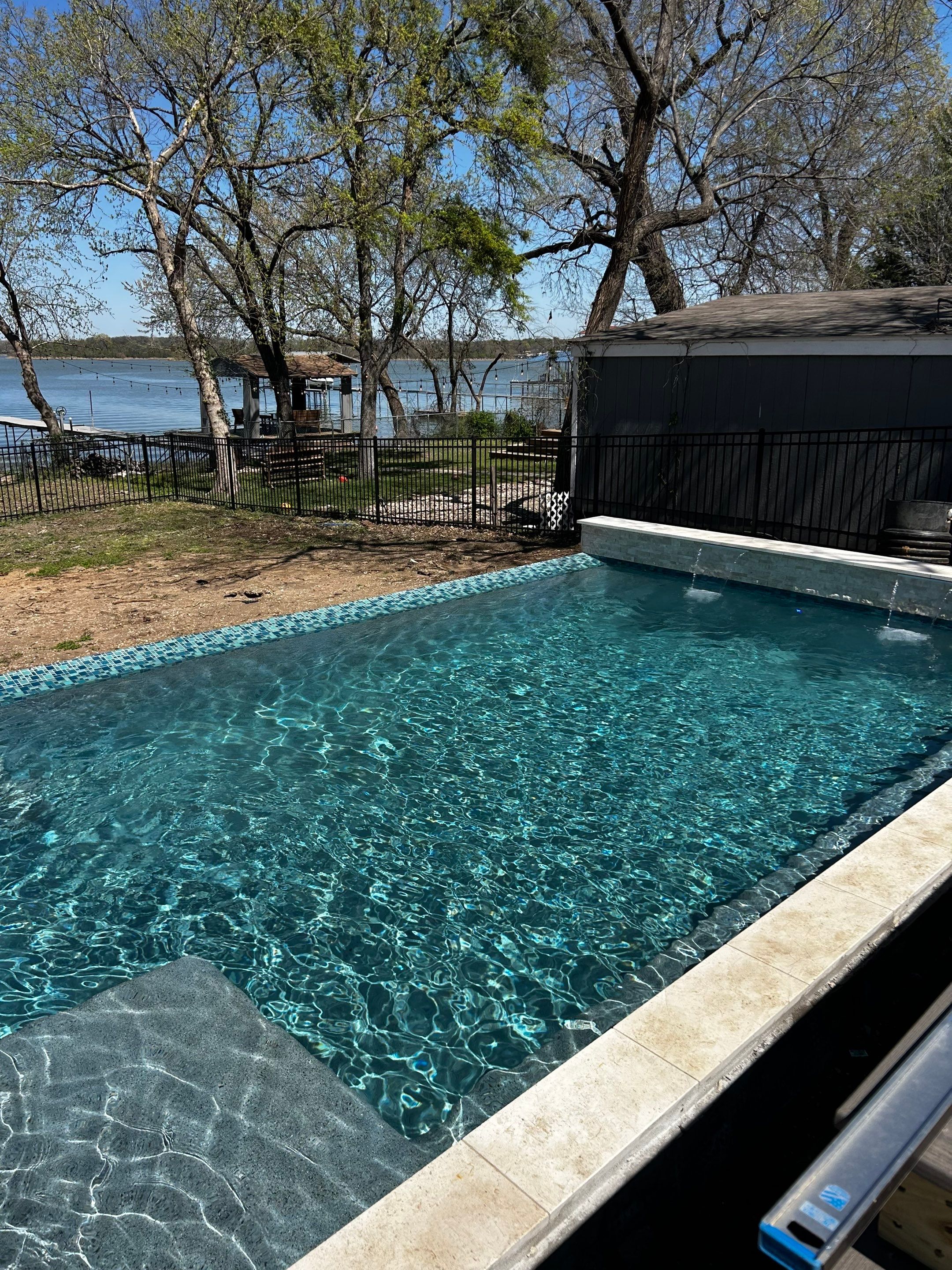 Lakefront Geometric Pool with Tanning Ledge by Pinnacle Pools and Spas - DFW