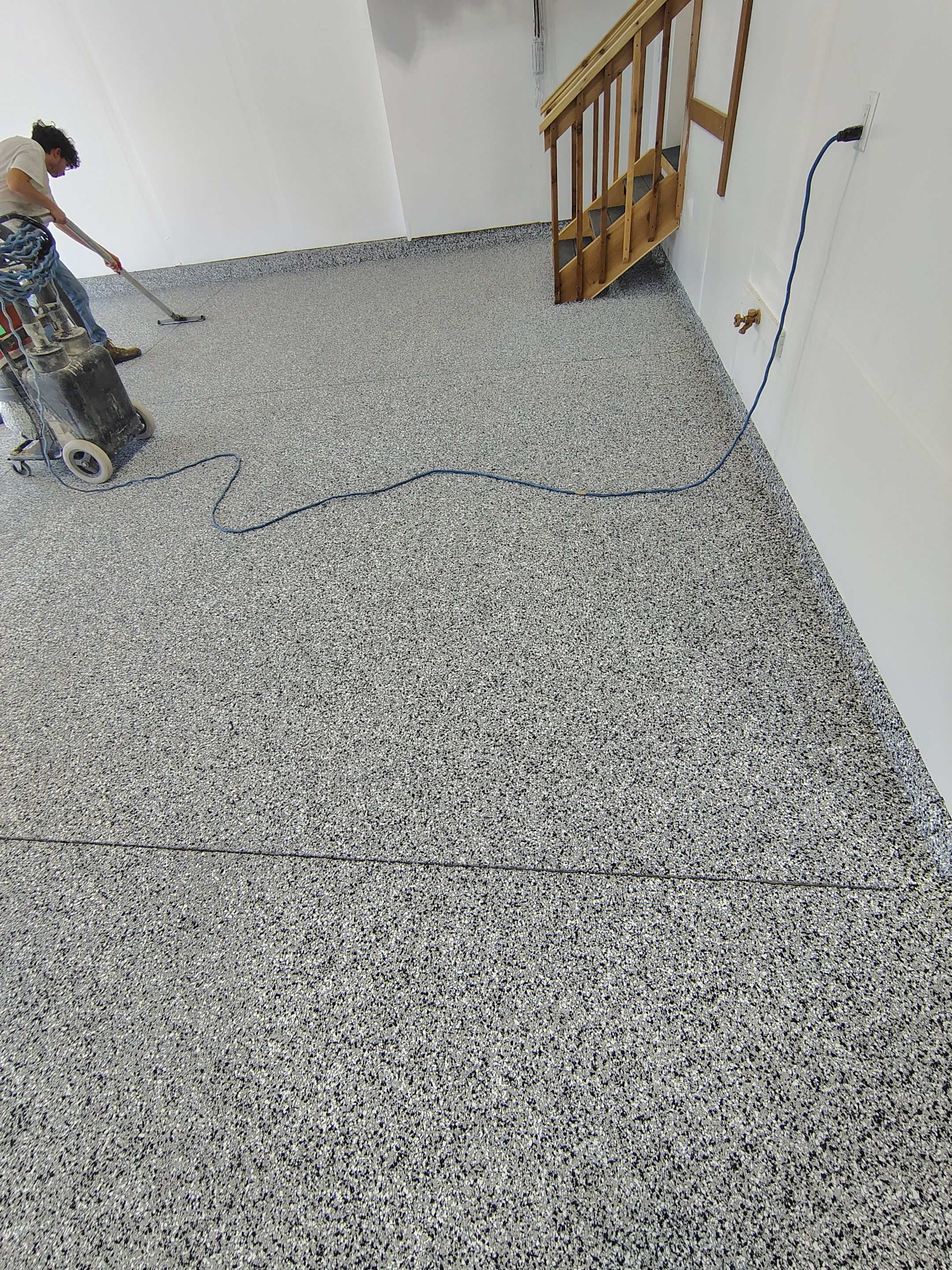 Decorative Flake Garage Floor Coating Installation in Tea, South Dakota by Select Painting, Coatings & Garage Cabinets