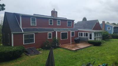 Siding Installation using James Hardie Countrylane red