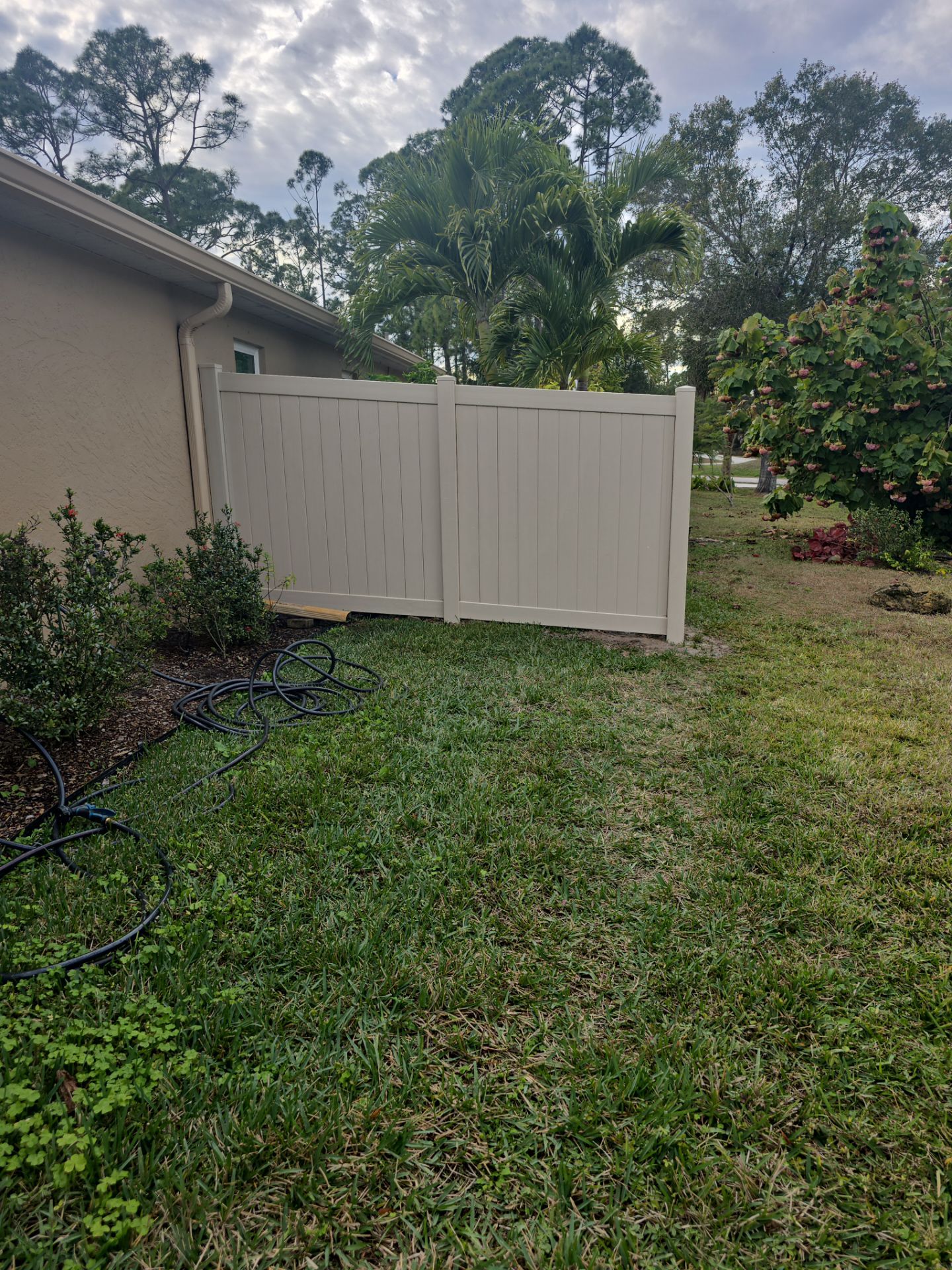 Tan Vinyl Fence in North Port by True Fence LLC