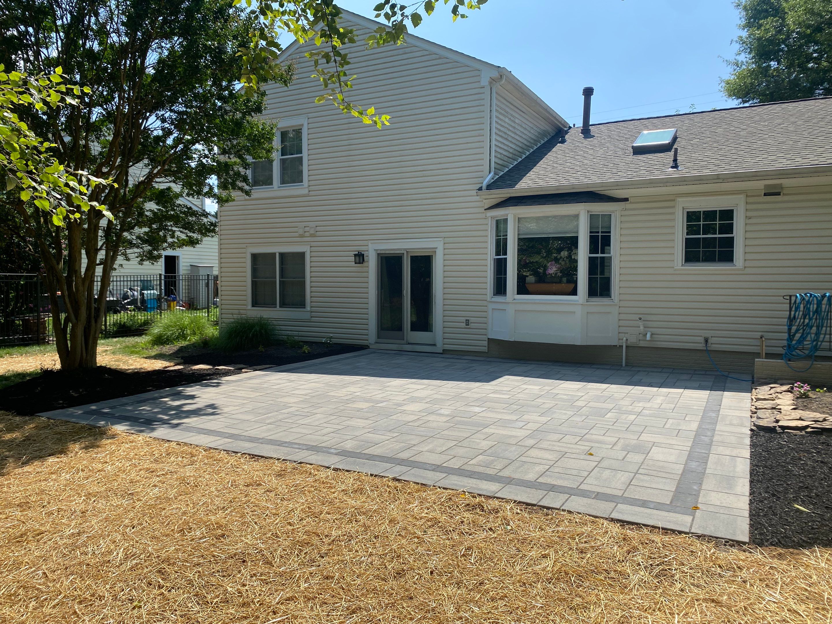 Backyard Transformation using Techo-Bloc Pavers by The Smet Companies, LLC