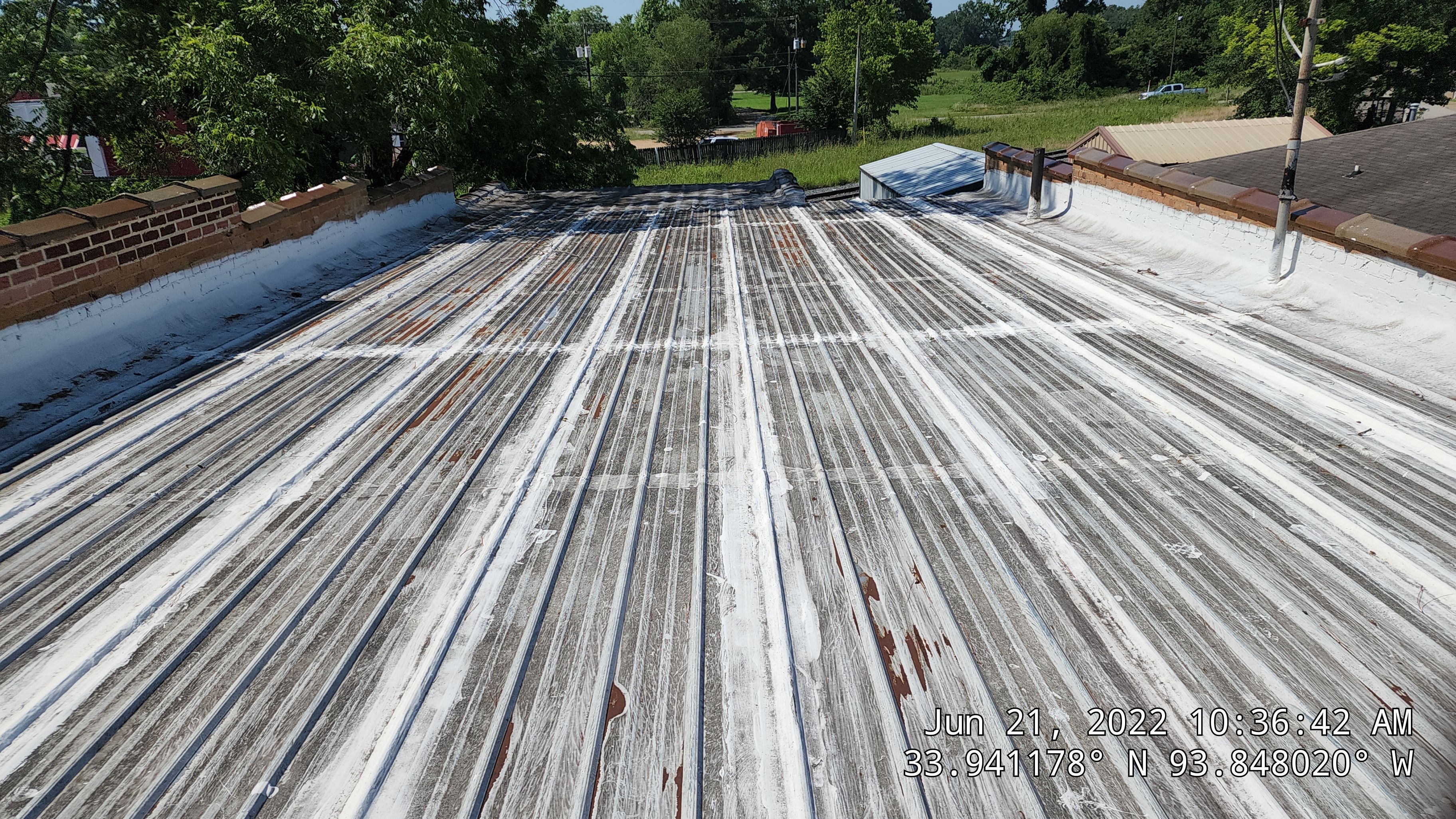 Commercial Roofing Installation using Aldocoat Coatings by Hostetler Roofing