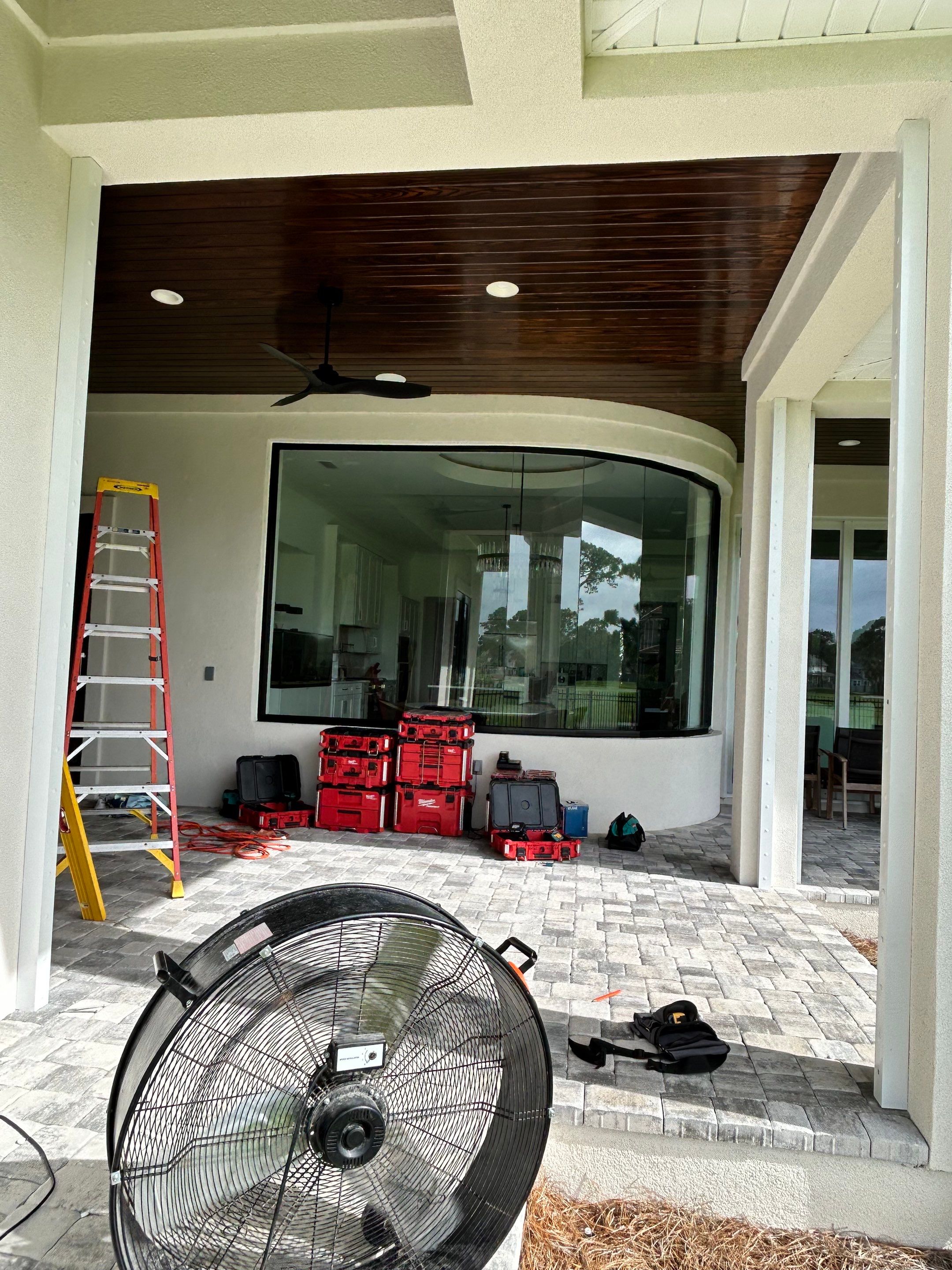 Motorized Screen and Solar Shade Installation in Panama City Beach by Brannan Aluminum Inc.