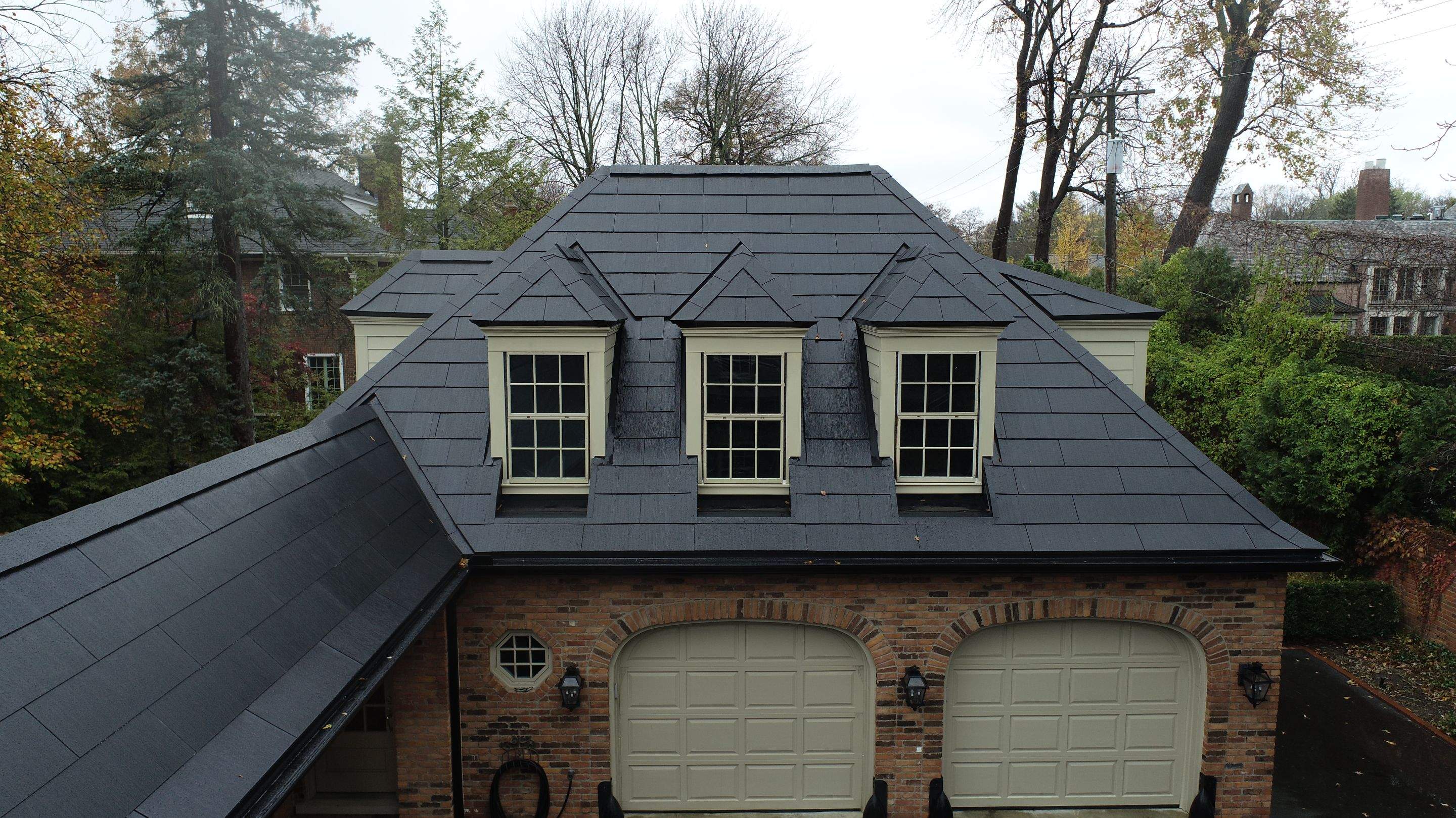 Tesla Solar Roof Replacement  by American Home Contractors