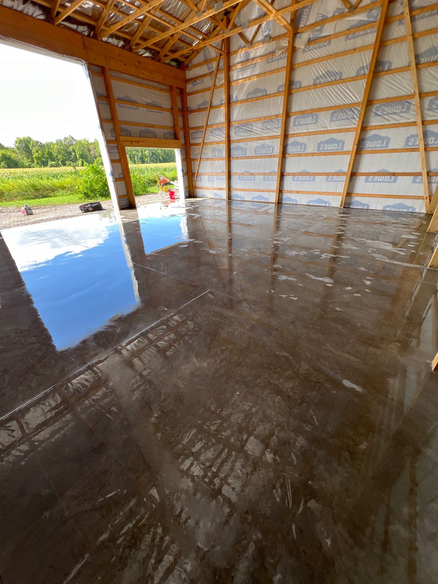 Pole barn floor  by NG Masonry & Construction LLC