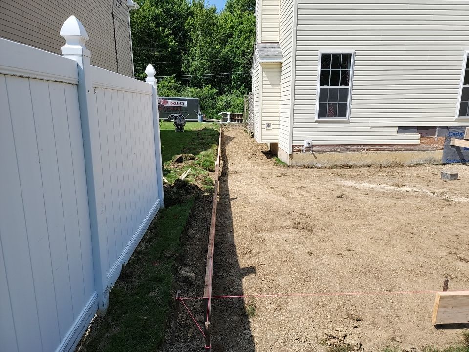 Stamped Concrete, Entry Door, and Concrete  by Ivy Lea Construction