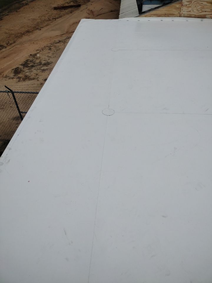 Office Building in Magnolia by Hostetler Roofing