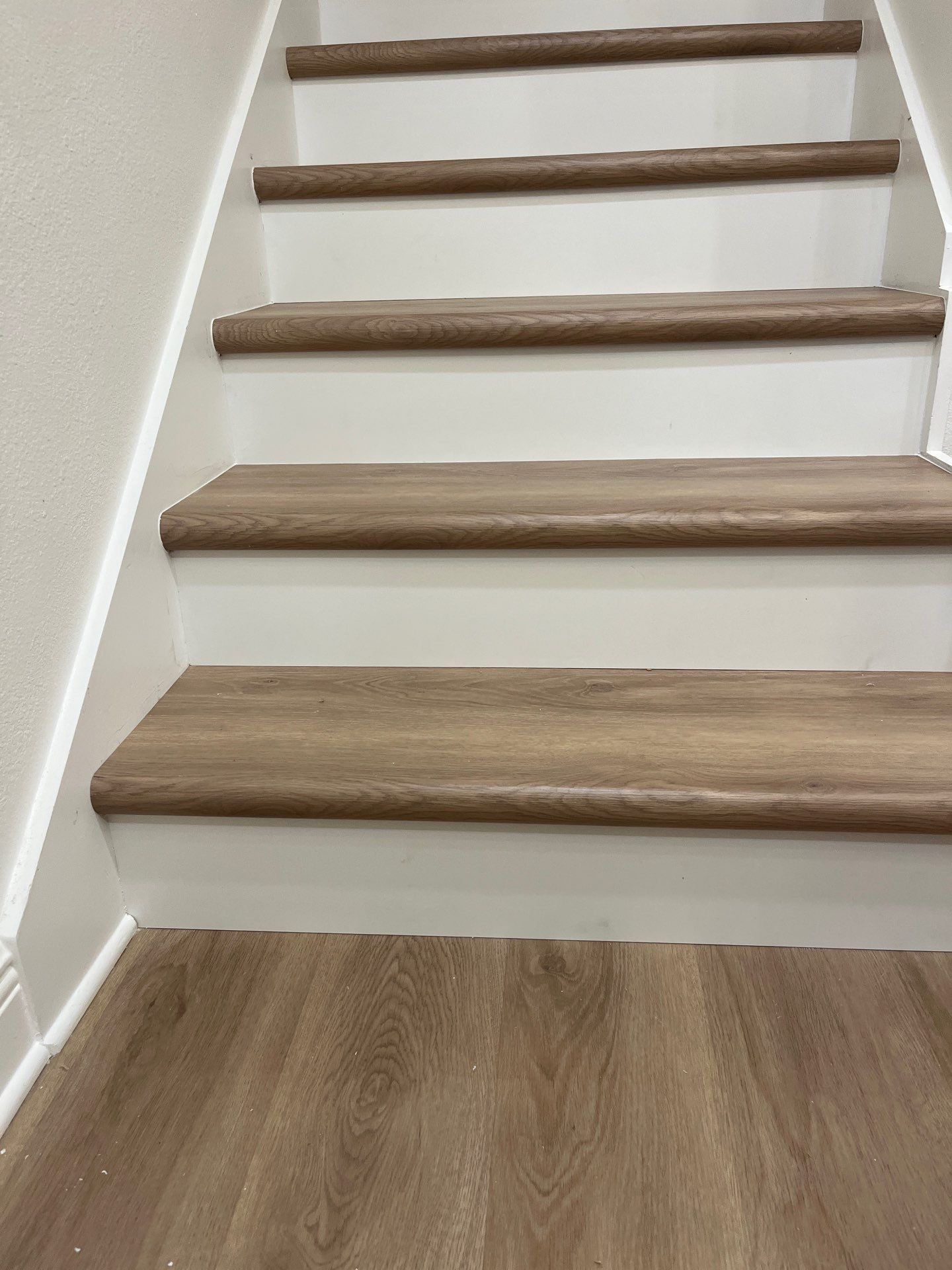 LVP stair upgrade by Vrmmm Flooring