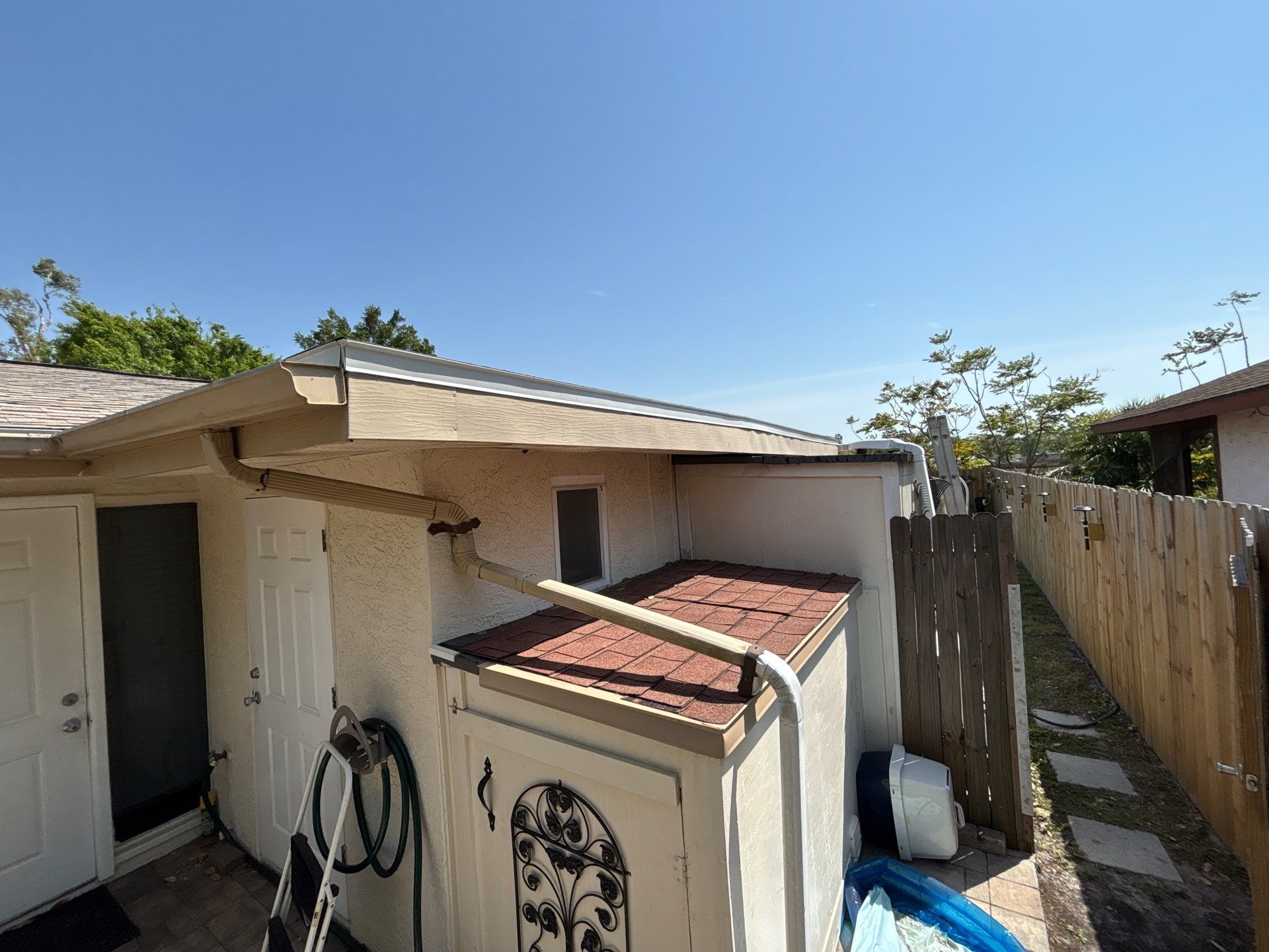 K-Style Seamless Gutter Installation using 3X4 Elbow Downspout in Sarasota FL by Gutter Professors