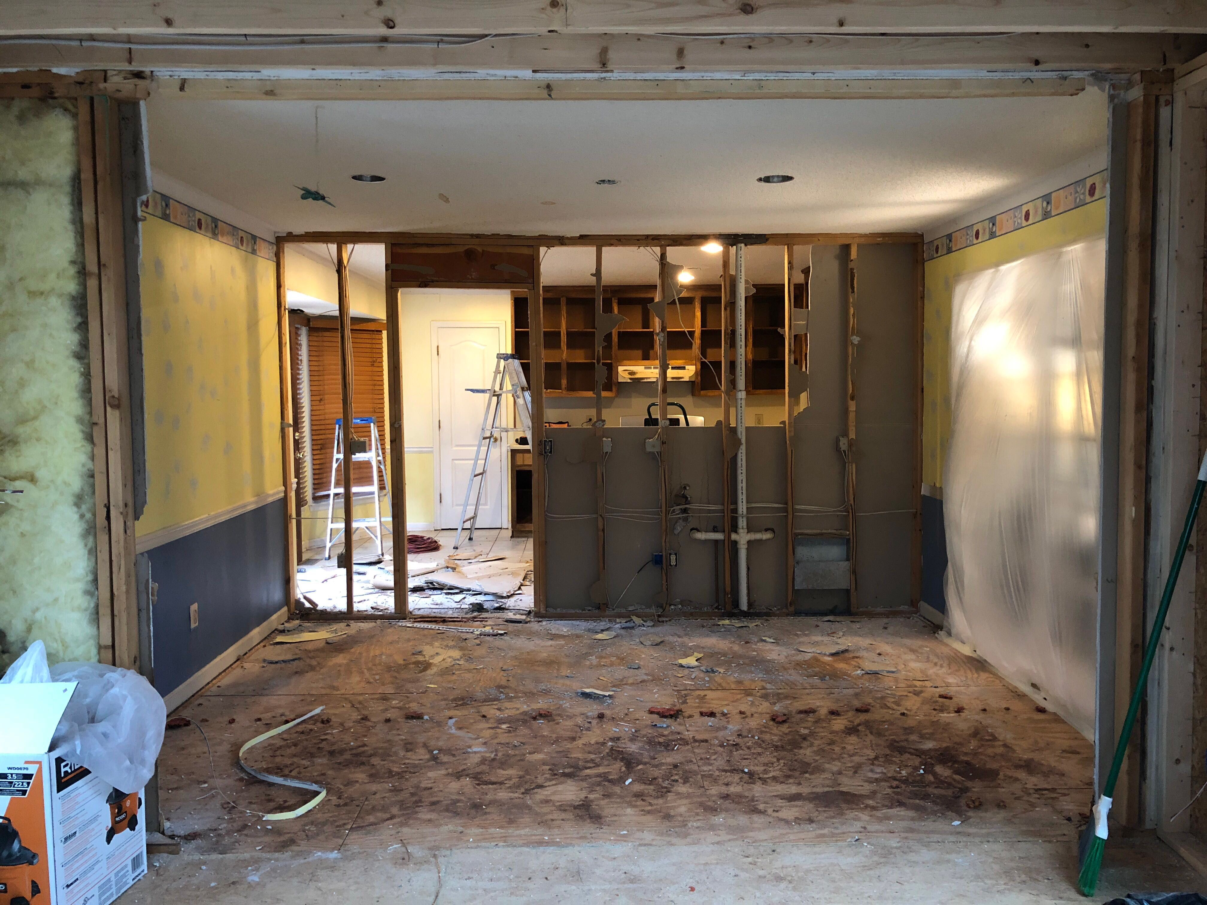 Open Concept Kitchen Remodel With White Shaker Cabinets in Kennesaw by Swift Home Renovations