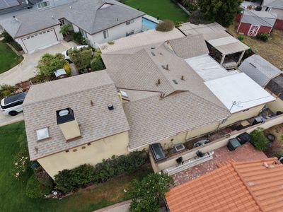 Architectural Shingle Roof Installation and Structural Sheathing Repairs