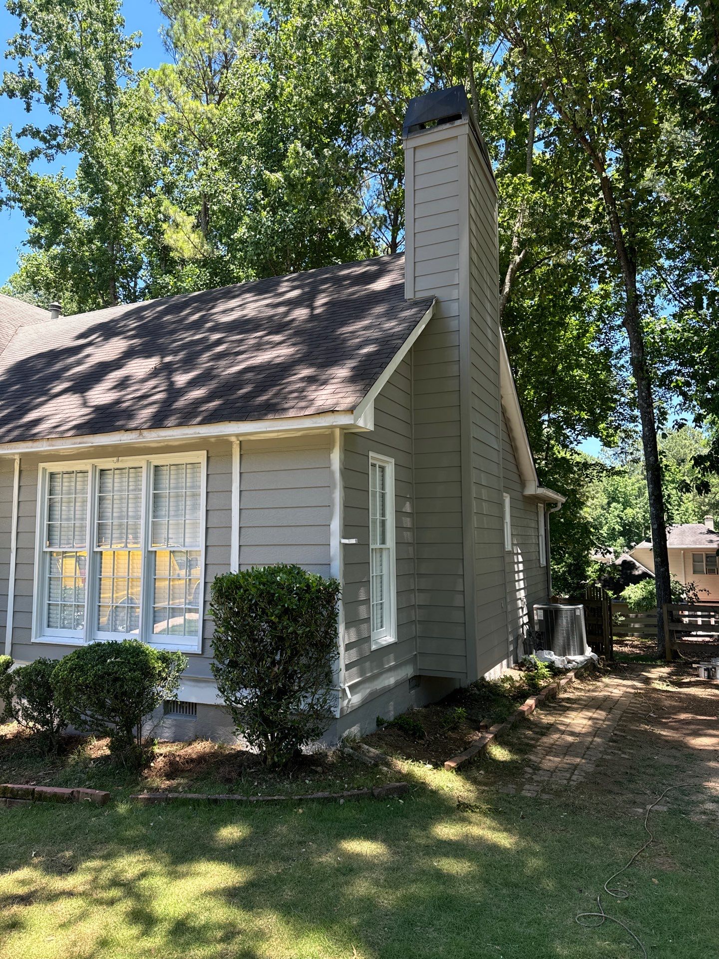 Exterior Painting and Chimney Siding Refresh in Woodstock, Georgia by Swift Home Renovations