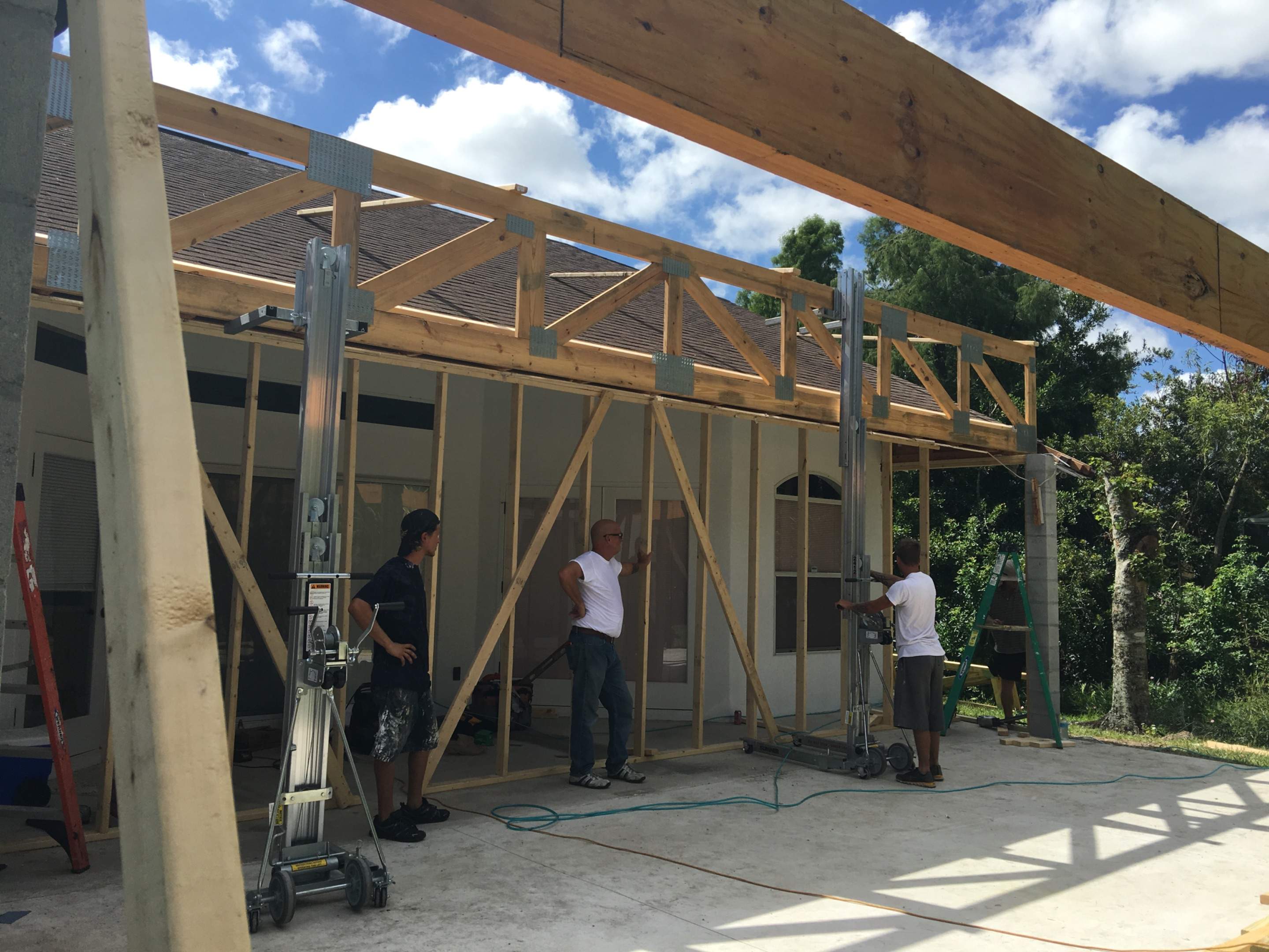 Covered Porch Extension and Structural Patio Addition in Melbourne by Florida Roofing and Renovations Inc.