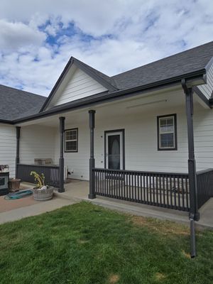 From Faded to Timeless: White & Black Exterior Renewal