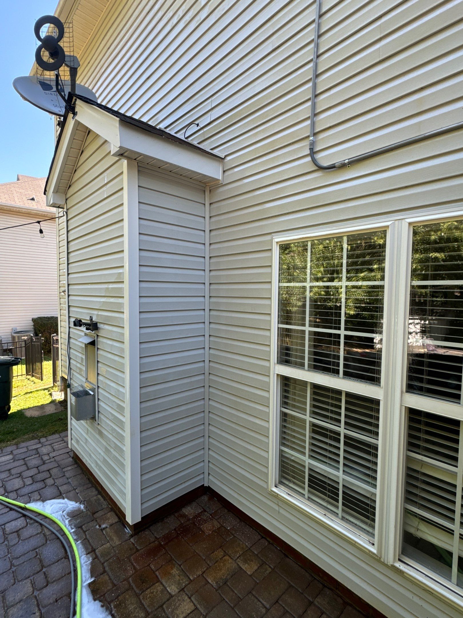 pressure washing the vinyl siding and brick patio of a house in winston salem nc