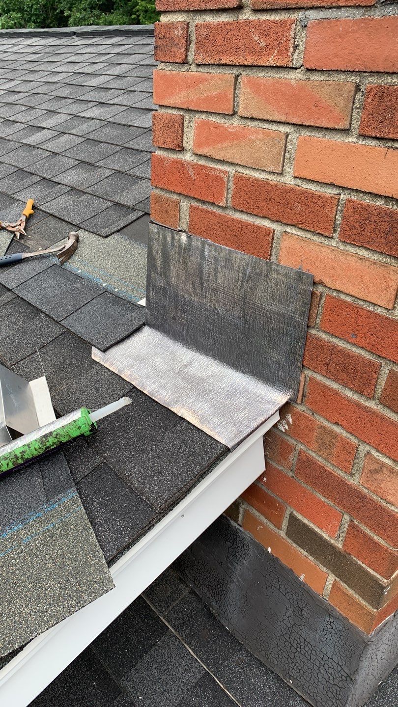 Residential Roofing Repair using Chimney Flashing by A Plus Exterior
